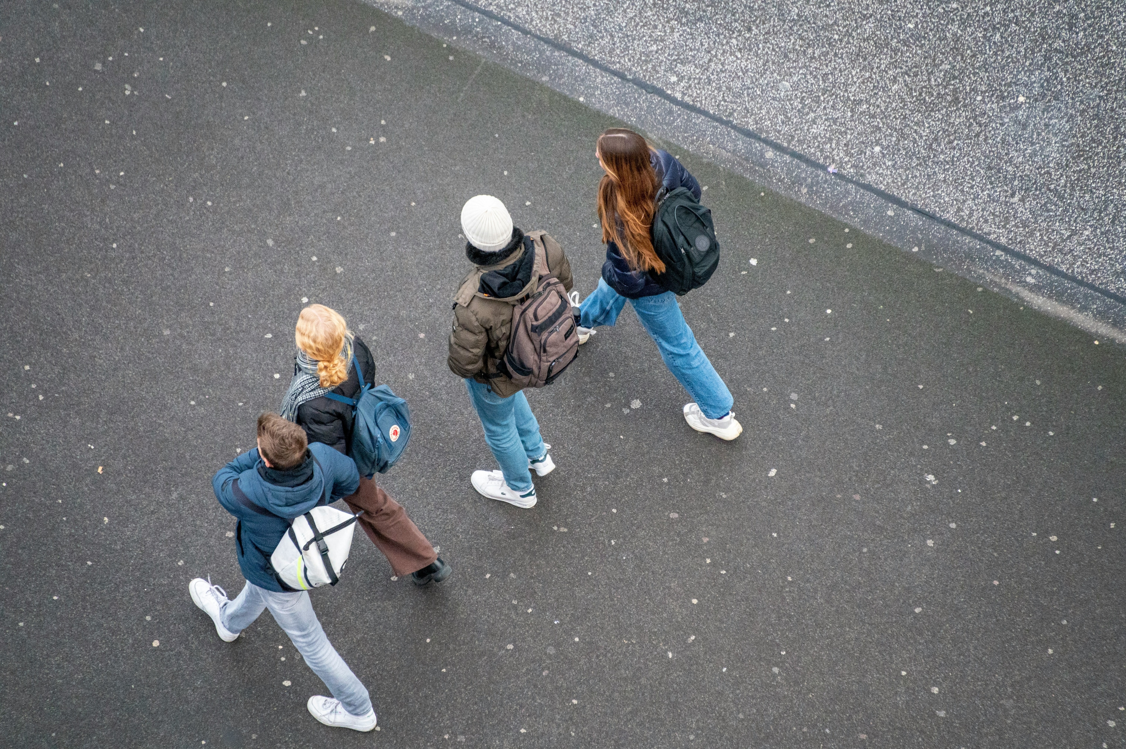 Young people walking down the street.