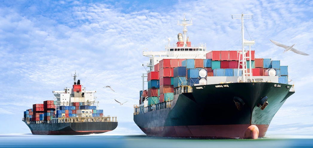 Two large vessels on the open sea; seagulls; container ships; blue sky with clouds; agentic supply chains
