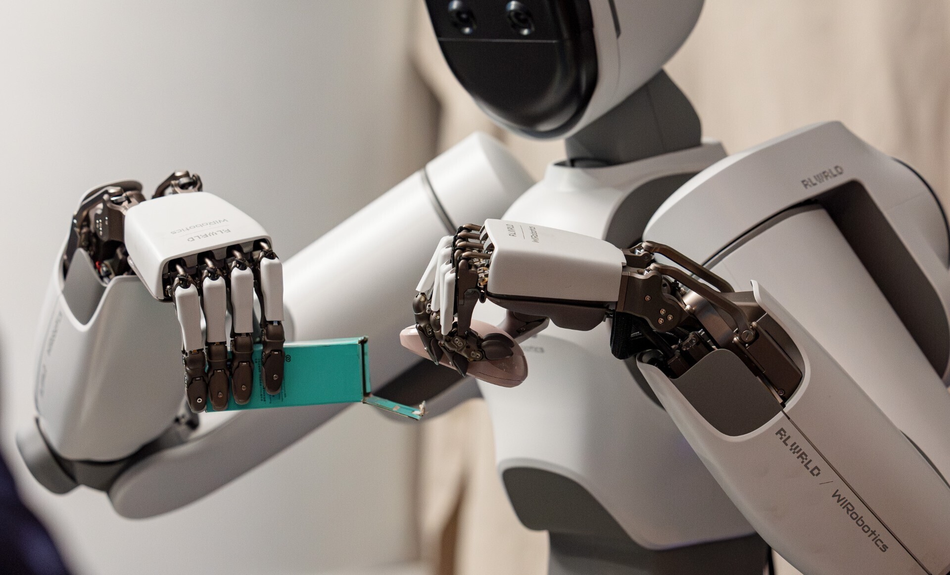 A RLWRLD robot with dexterous hands.