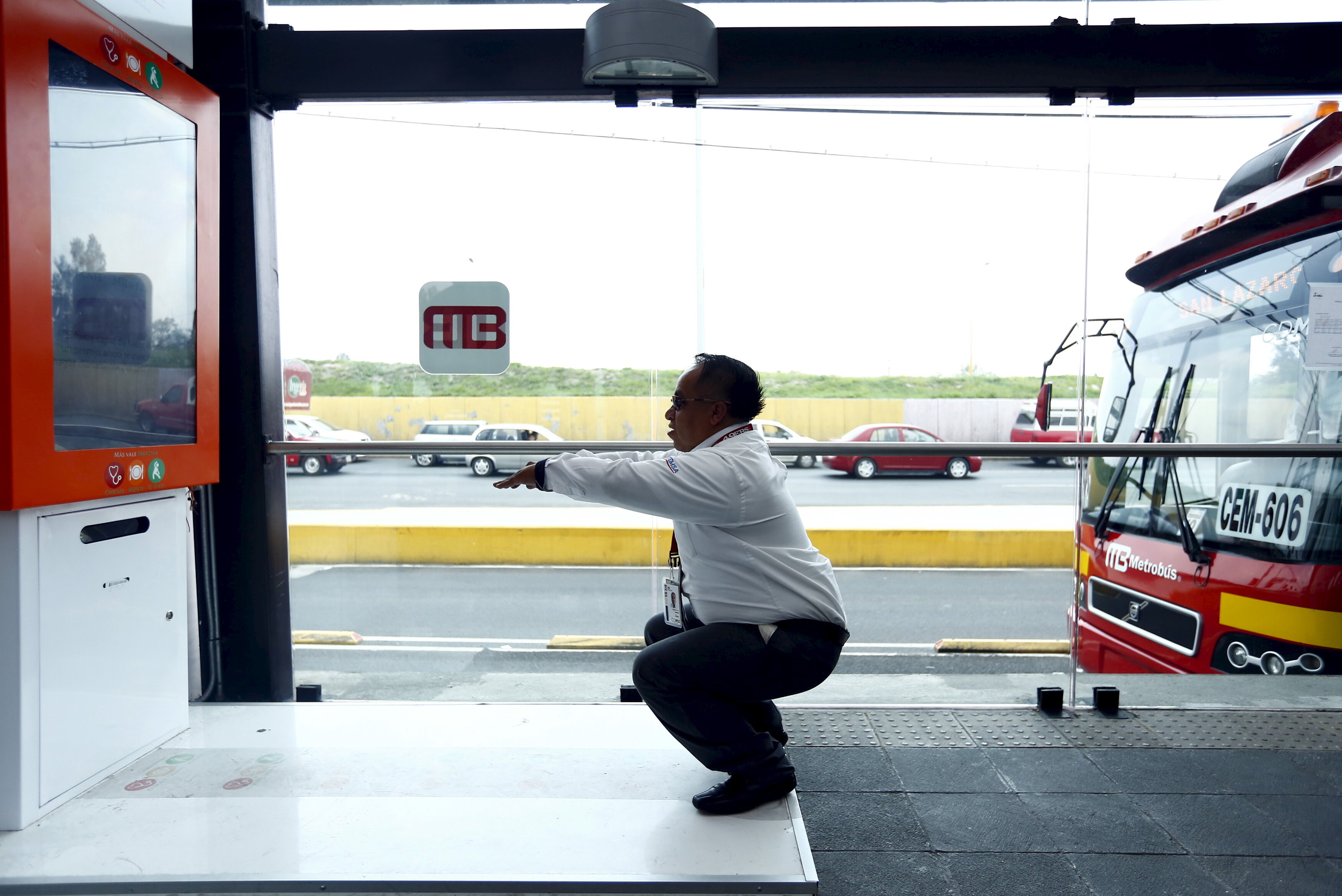 A metrobus driver performs squats at Rio de los Remedios metrobus station in Mexico City, July 23, 2015. To combat growing obesity, lawmakers have introduced a new campaign encouraging physical activity. This machine, installed in 21 metrobus stations around the city, asks its user to do 10 squats, and when all ten are performed correctly, it prints out a free ticket. REUTERS/Edgard Garrido. chronic diseases