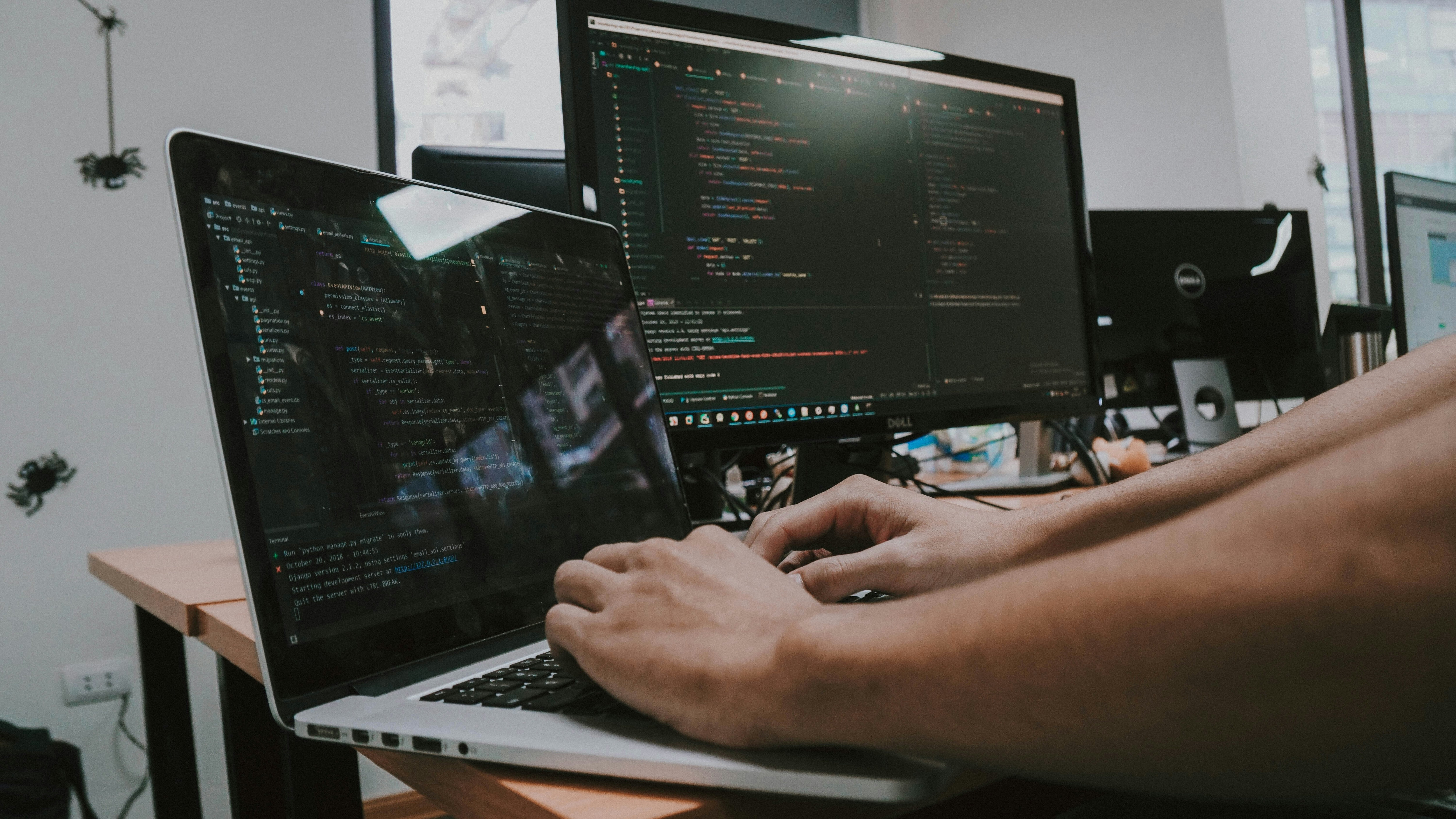 Hands on a keyboard as AI-powered tools change the cyber landscape. 