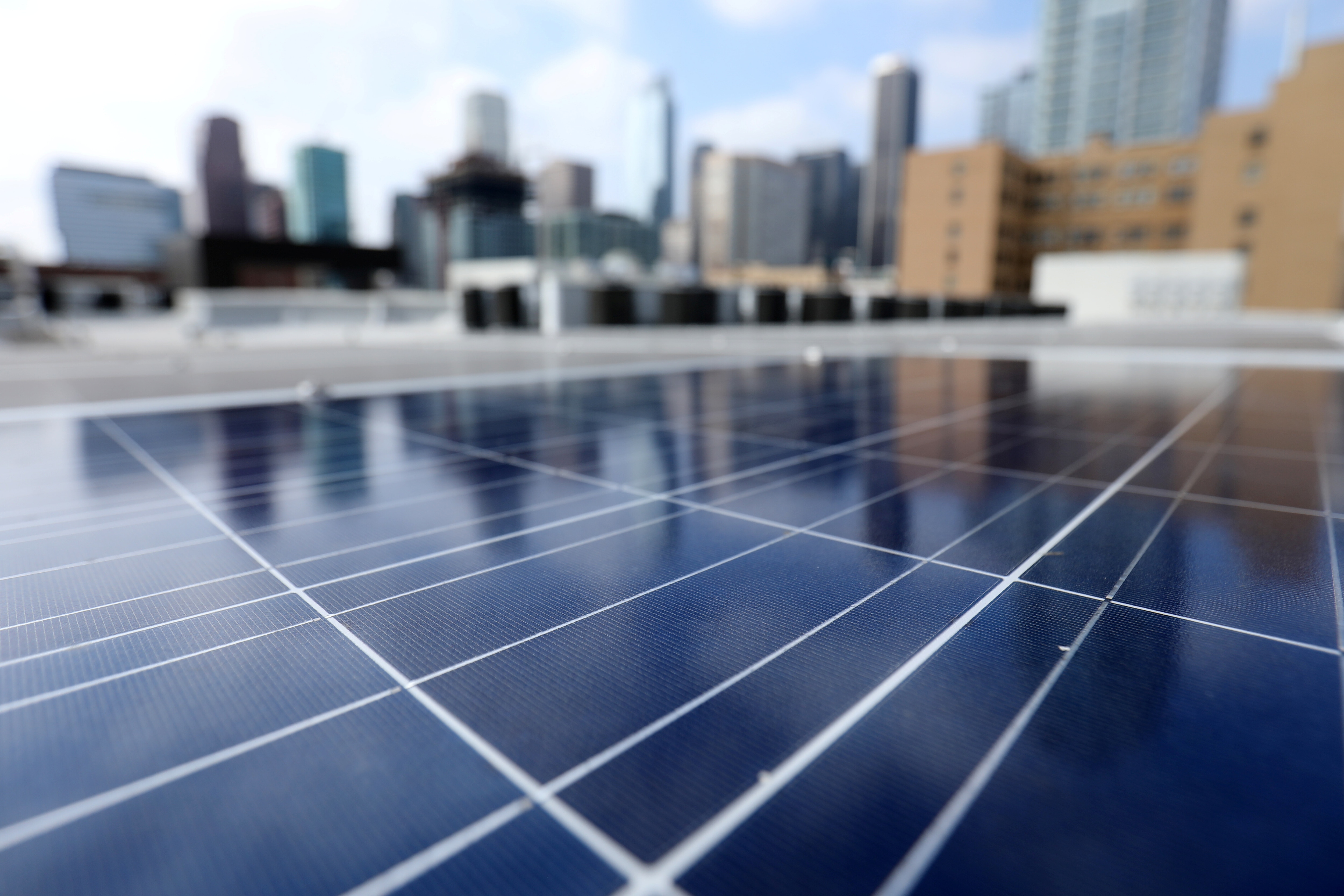 Solar electric panels are shown installed on the roof of the Hanover Olympic building, the first building to offer individual solar-powered net-zero apartments in Los Angeles, California, U.S., June 6, 2017: Thousands have pledged net zero goals but few have credible strategies 