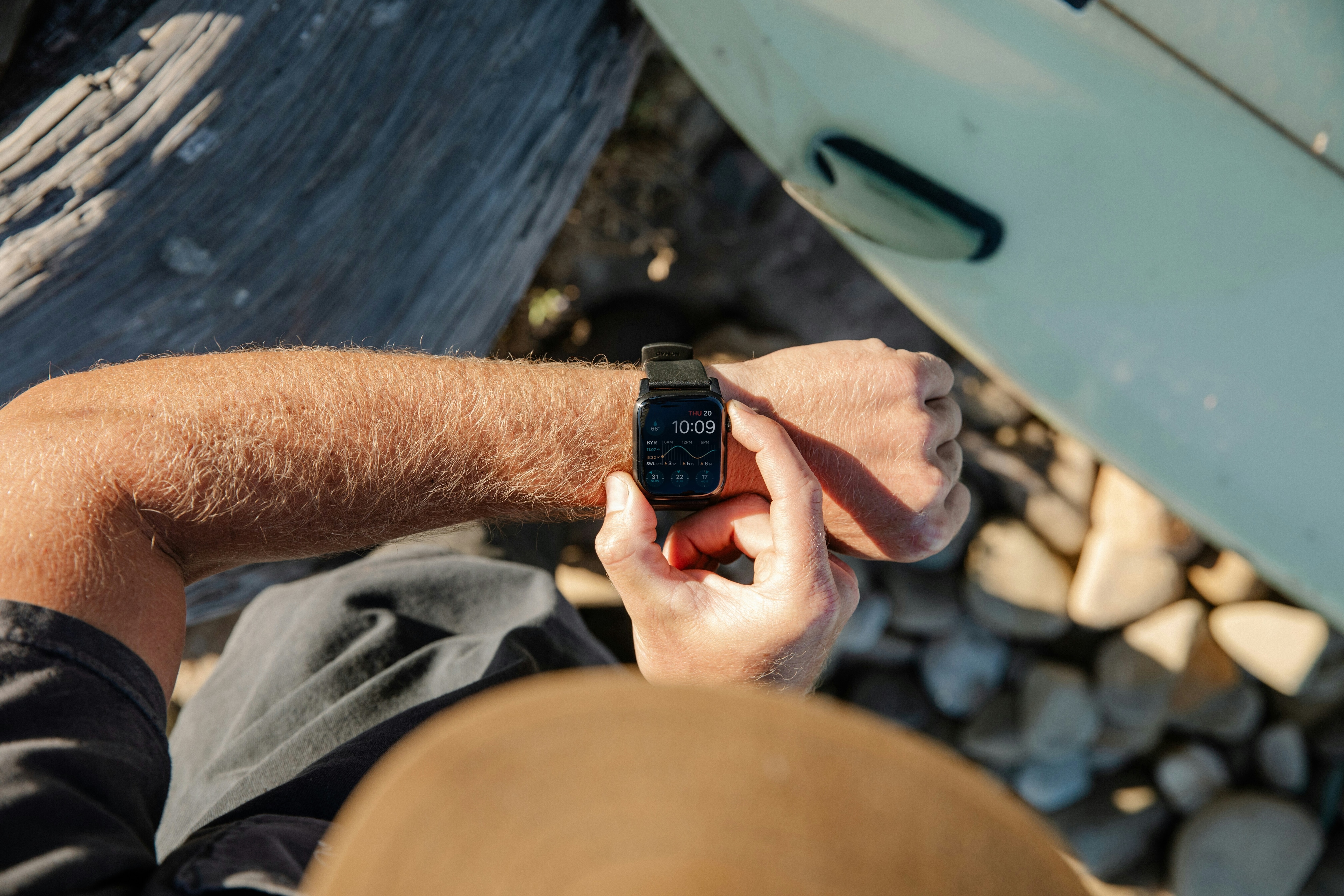Person looking at smart watch which can maybe help improve ageing