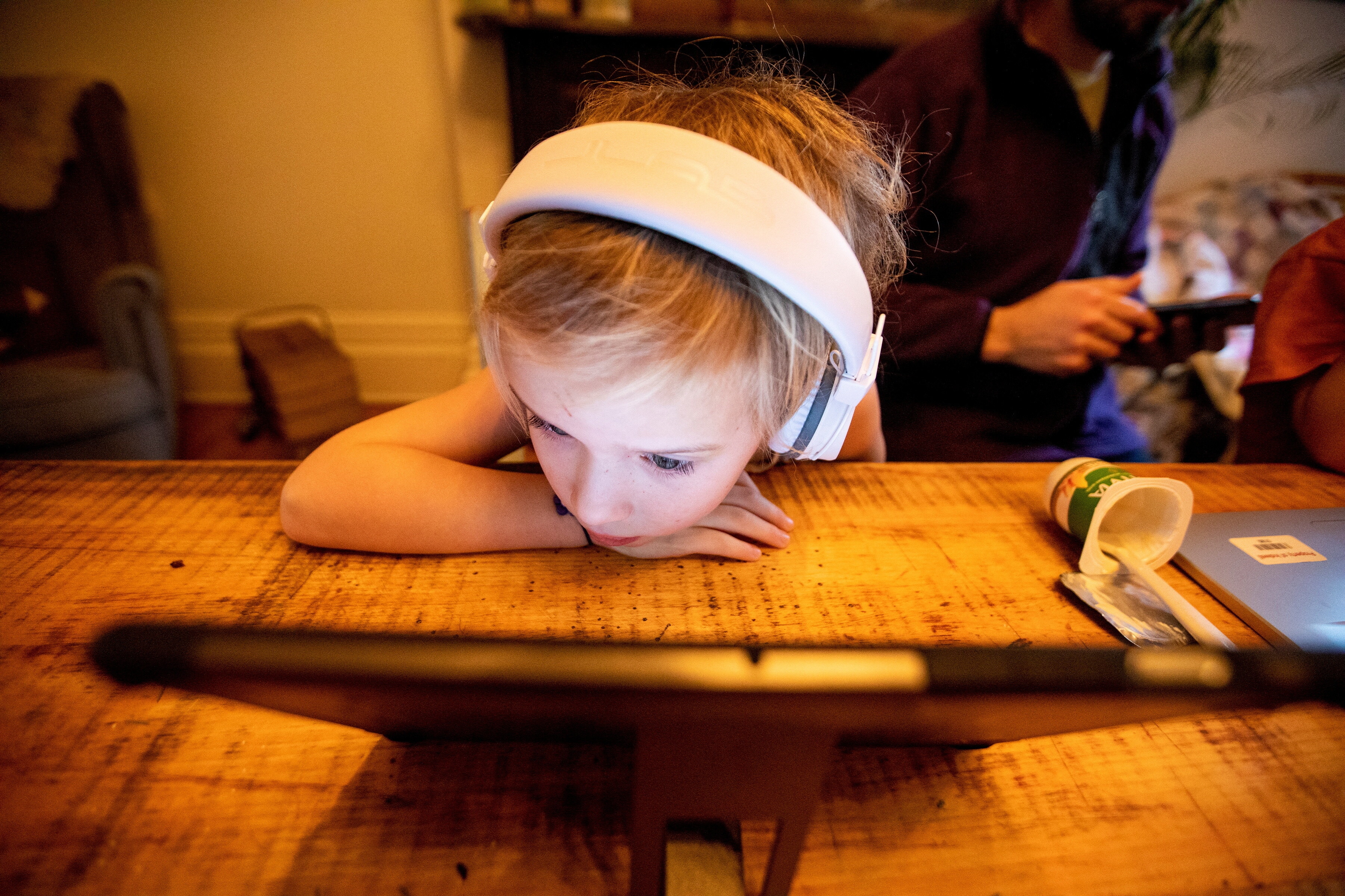 Willa Stief, one of the six-year old twins during online school while their parents work from home and take care of a toddler amid surging COVID-19 cases caused by the coronavirus Omicron variant, in Hamilton, Ontario, Canada January 7, 2022. REUTERS/Carlos Osorio