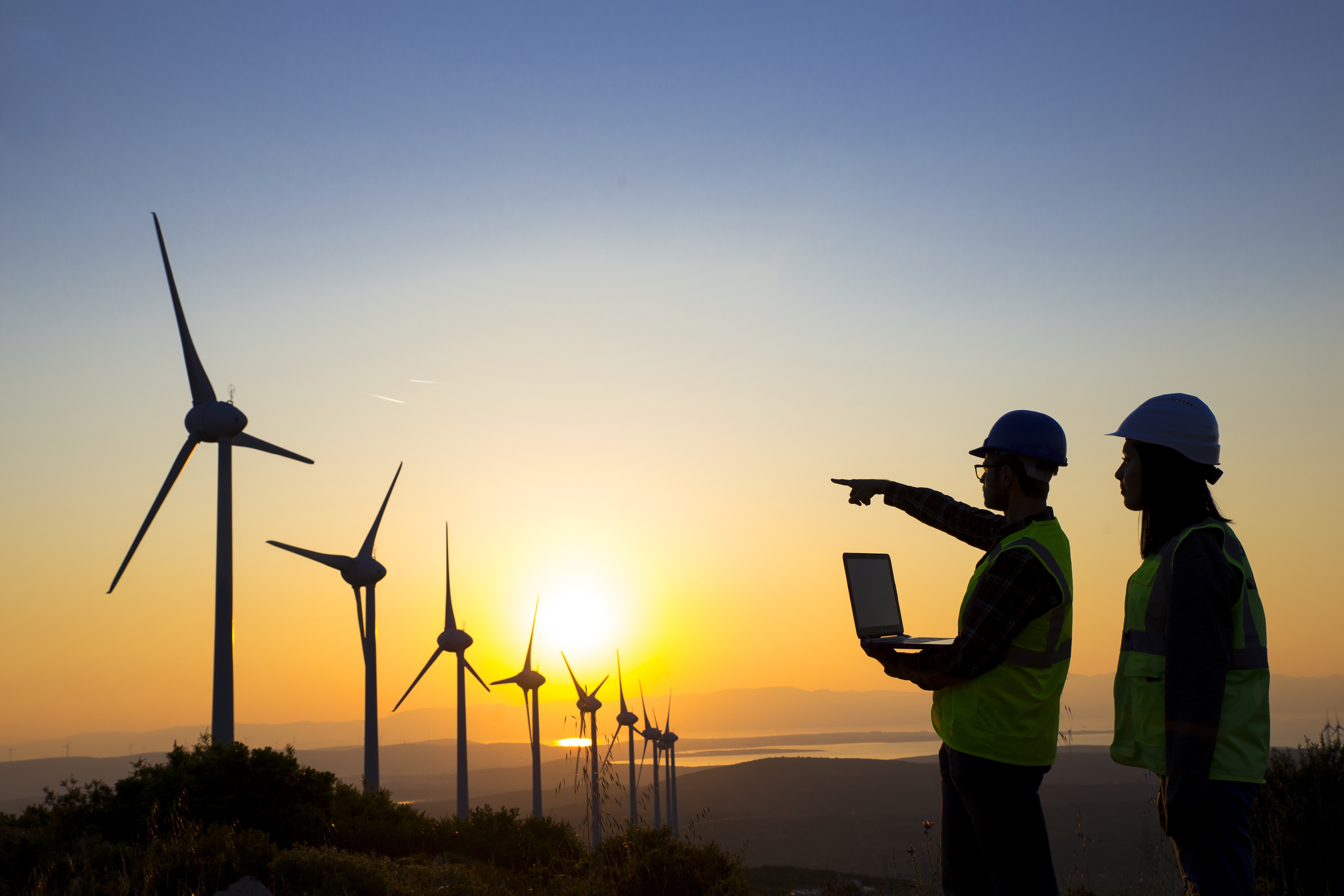 Engineers of wind turbine. Energy transition