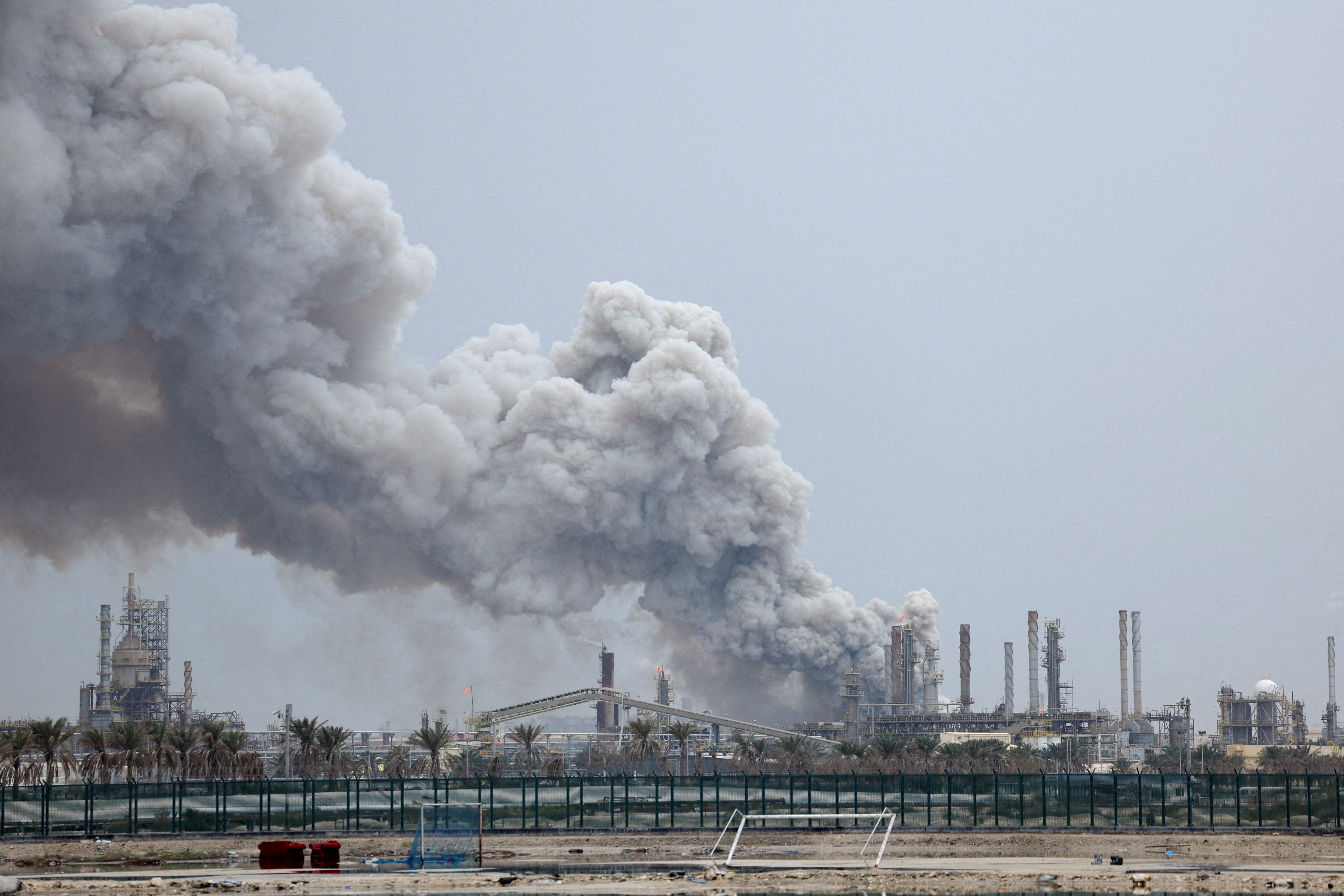 FILE PHOTO: Smoke rises following a strike on the Bapco Oil Refinery, amid the U.S.-Israeli conflict with Iran, on Sitra Island Bahrain, March 9, 2026. REUTERS/Stringer/File Photo