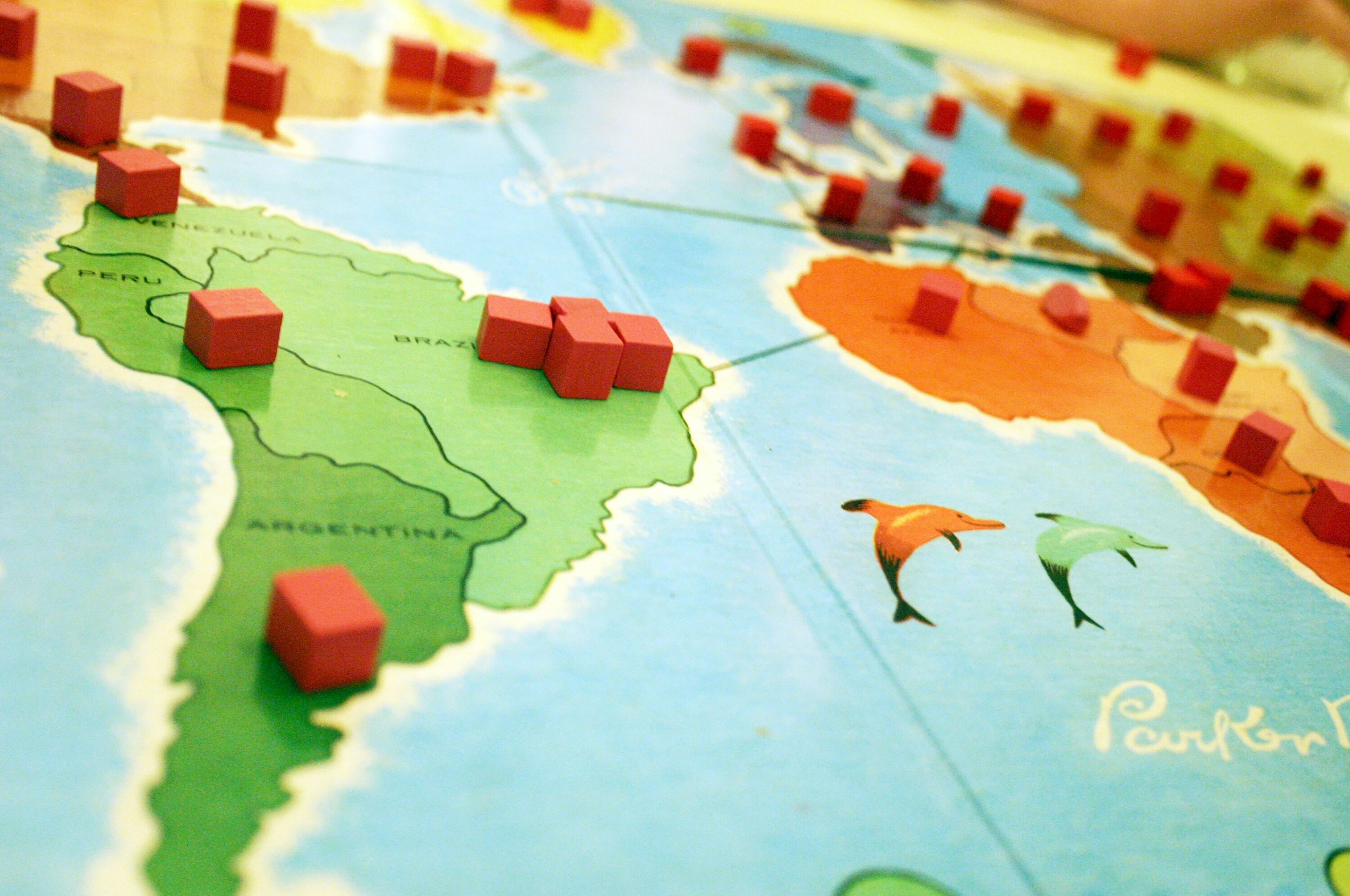 A closeup of a map of Latin America and Africa in the background: Could mini-coalitions be the way forward in geopolitics?