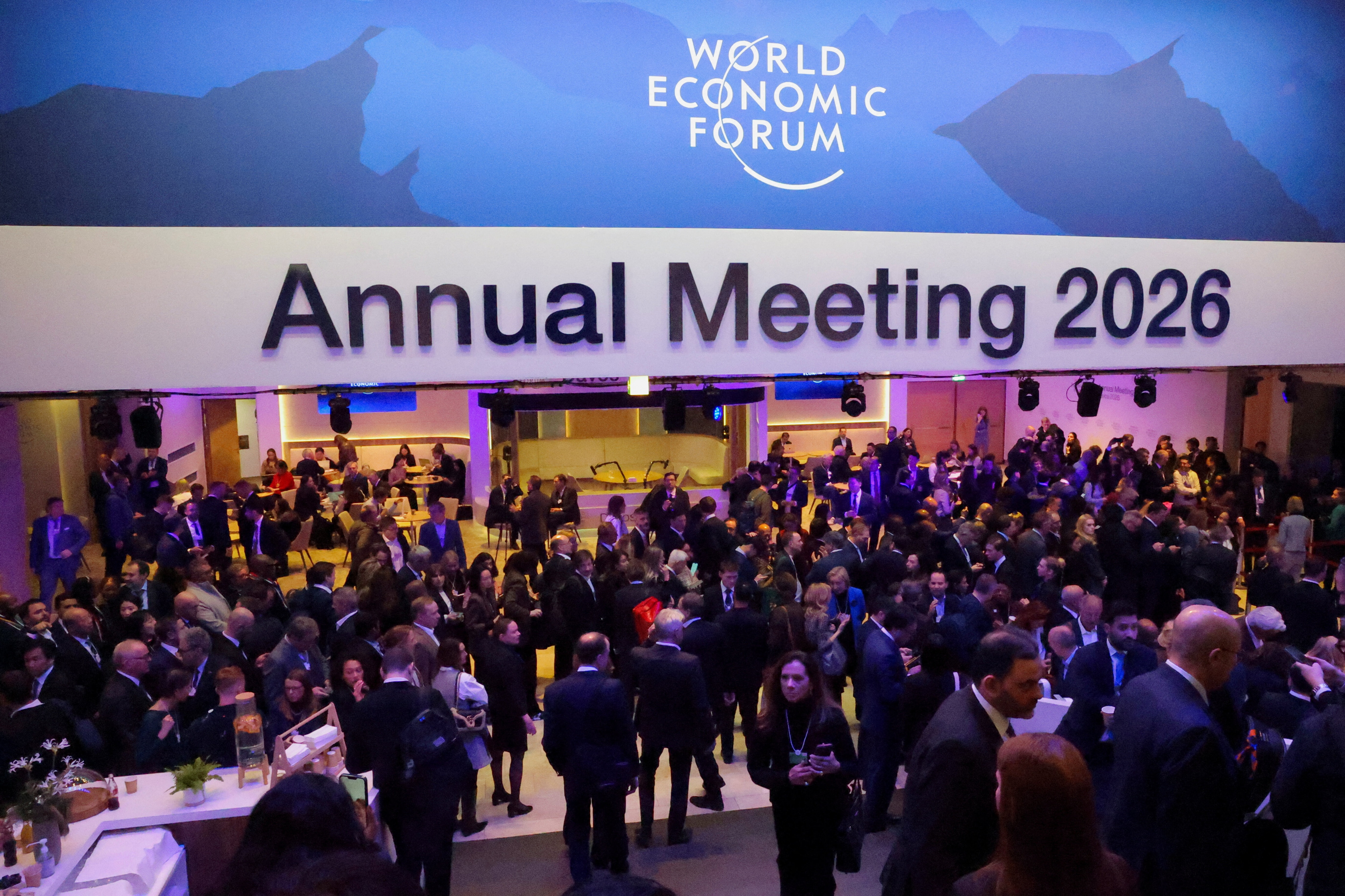 Attendees walk at the building during the 56th annual World Economic Forum (WEF) meeting in Davos, Switzerland, January 21, 2026: Over 100 Global Future Council members provided input at Davos 2026