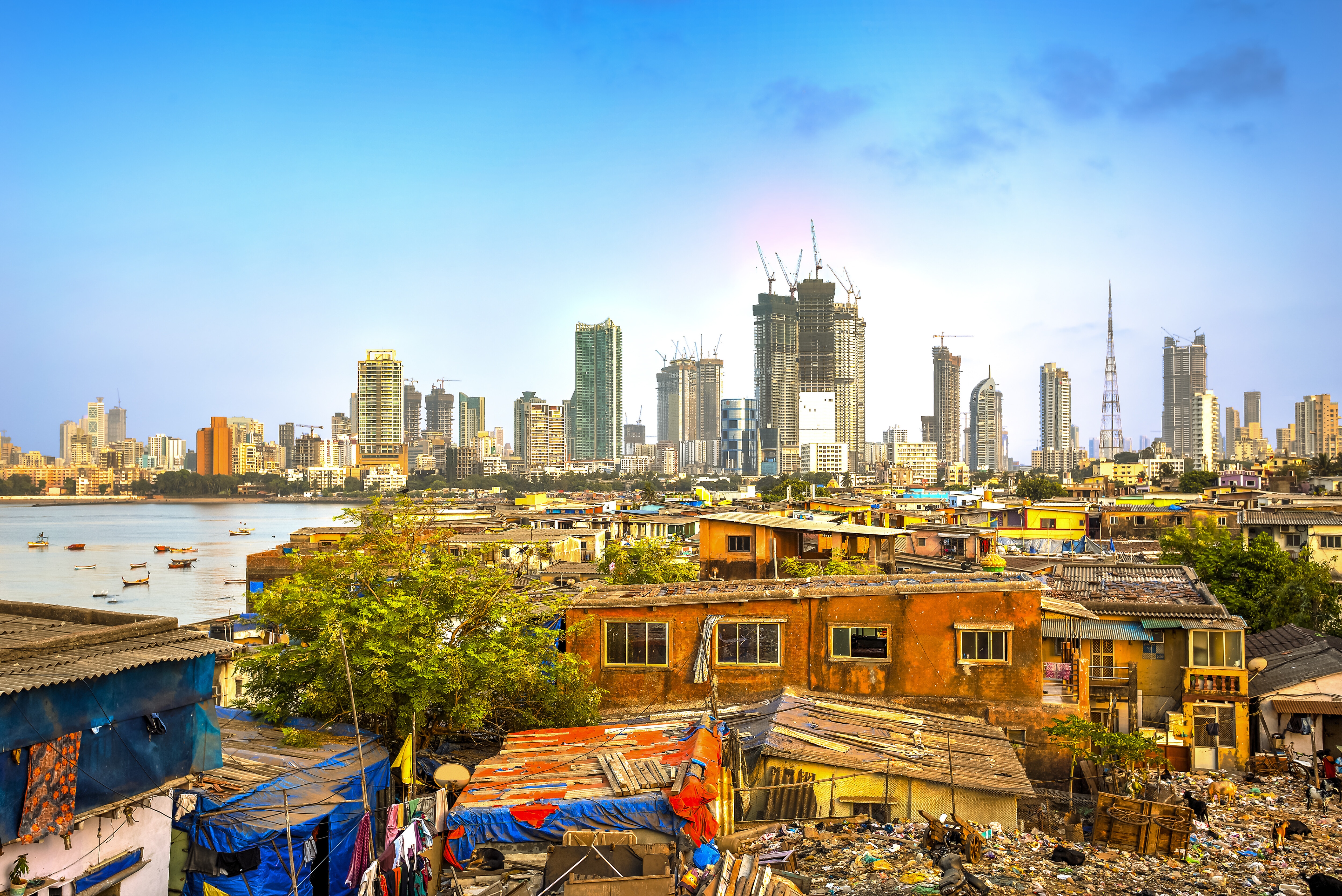 Mumbai cityscape as an example of the big contrast between poverty and wealth in Asia.