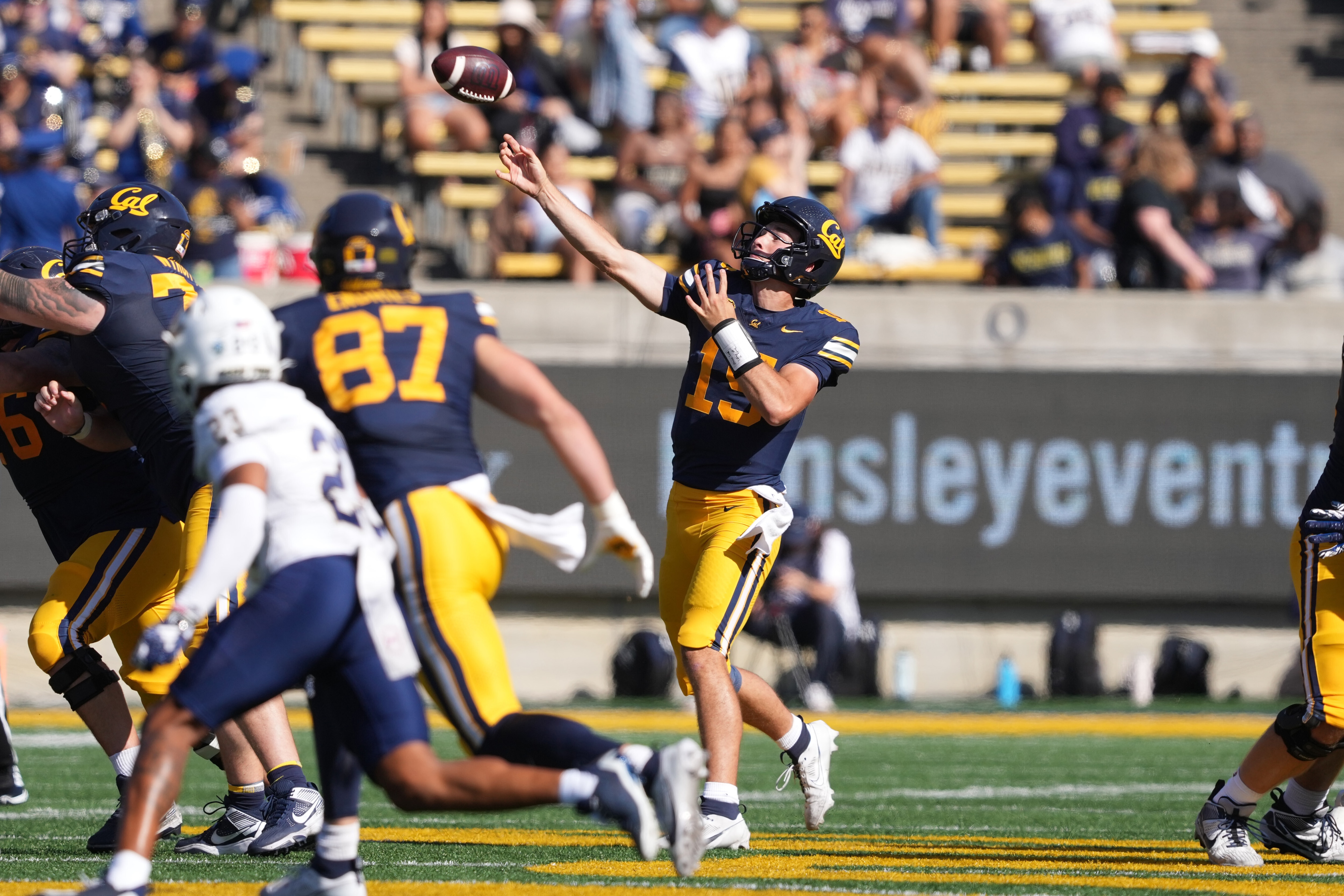 Aug 31, 2024; Berkeley, California, USA; California Golden Bears quarterback Fernando Mendoza (center) throws a pass against the UC Davis Aggies during the third quarter at California Memorial Stadium: Changes in Name, Image and Likeness rights is making financial literacy critical for student athletes