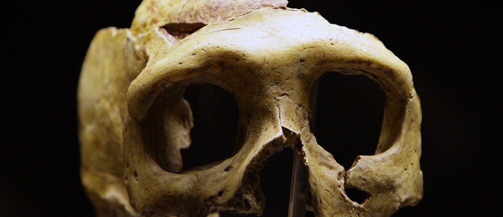 How do archaeologists discover forgotten ancient monuments?