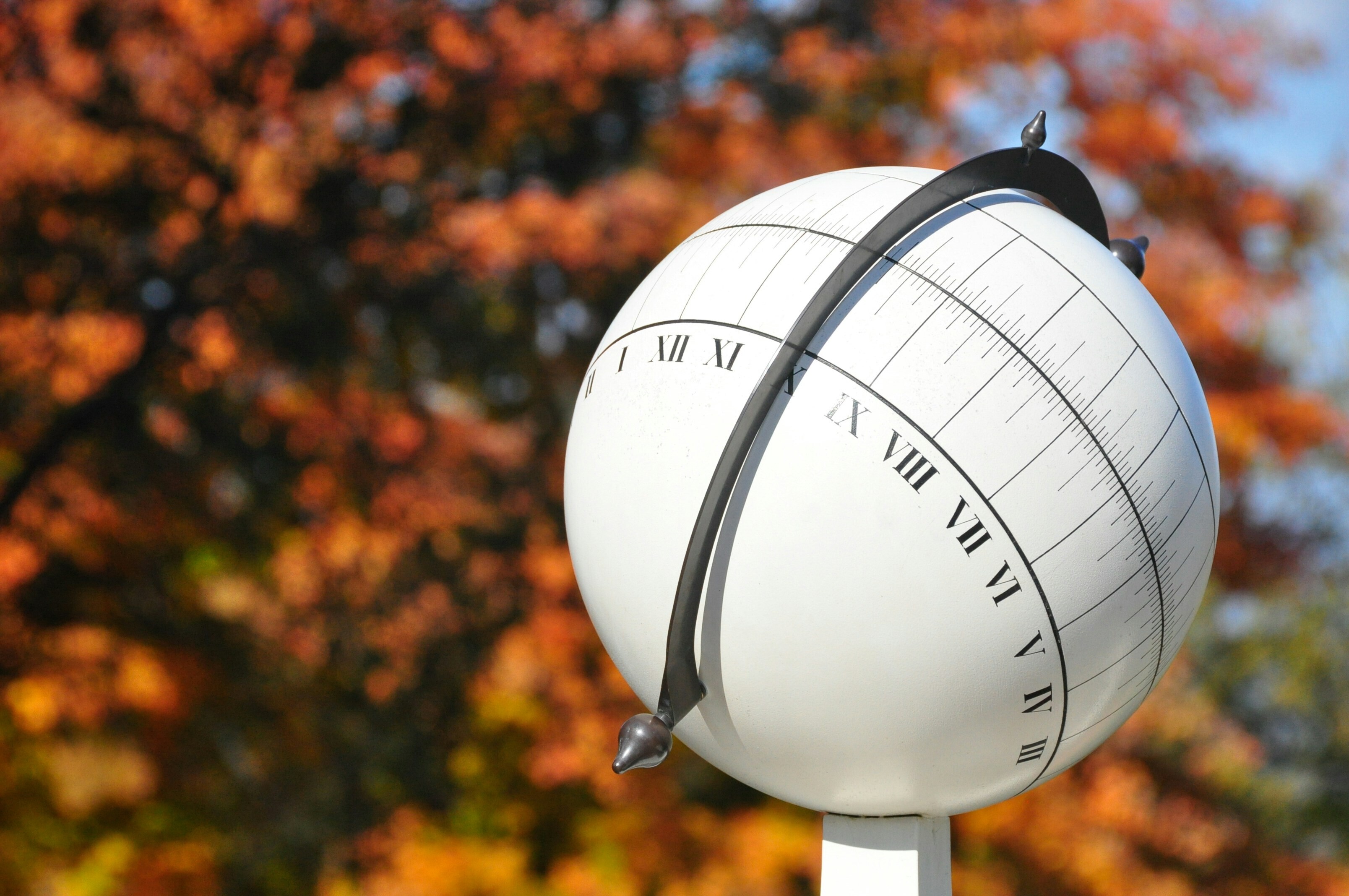 Sundial from Thomas Jefferson's plantation in Virginia shaped like a globe with hours and seconds displayed