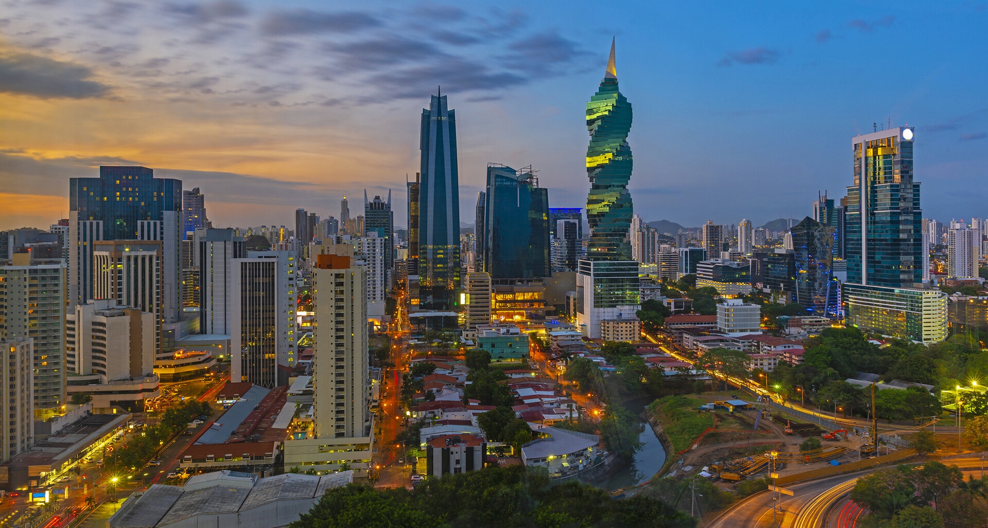The colourful panoramic skyline of Panama City at sunset with high rise skyscrapers, Panama, Central America.