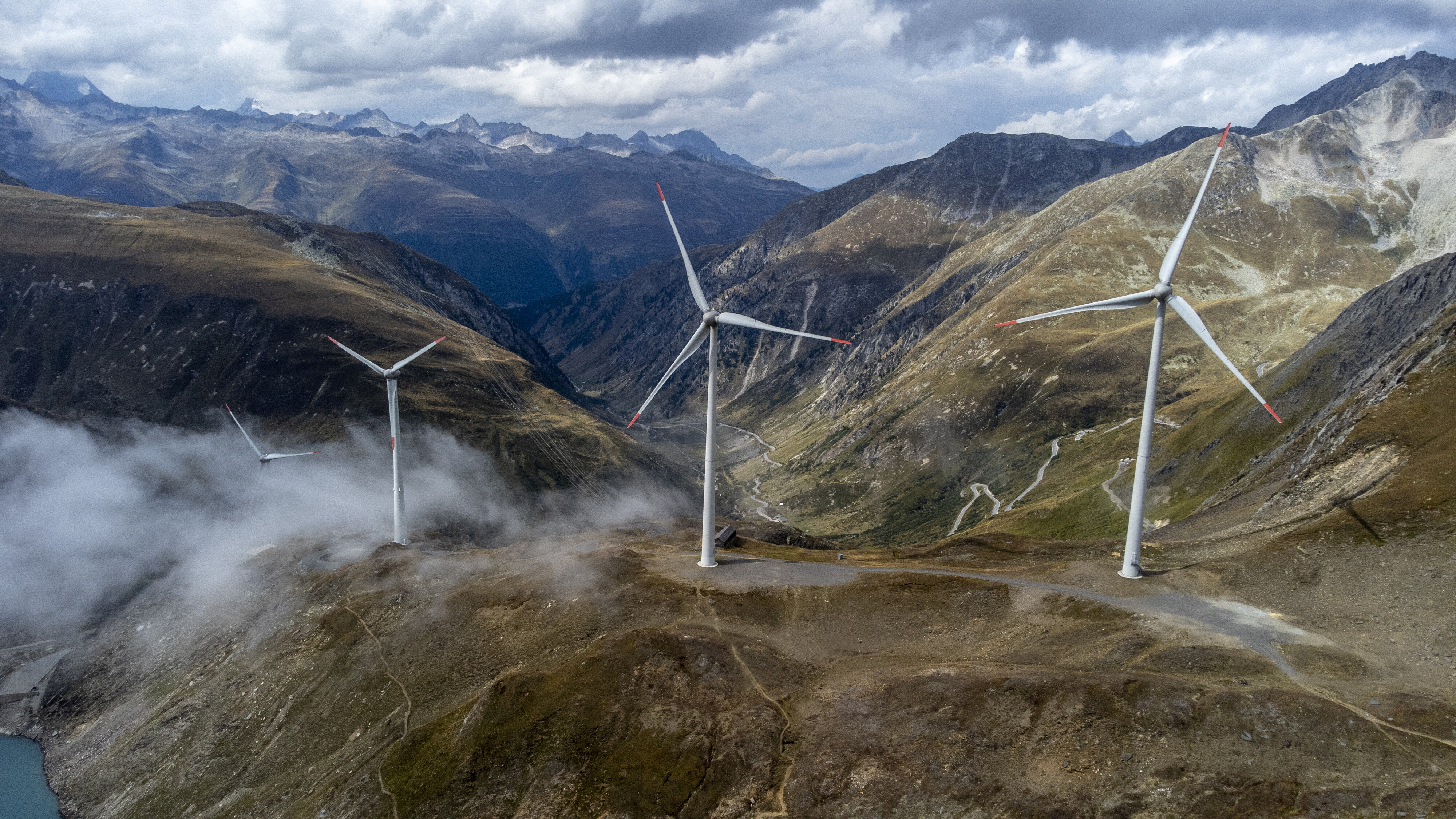 Windmills are seen at SwissWinds farm, Europe's highest wind farm at 2500m, near the Nufenen Pass in Gries, Switzerland, September 2, 2022.  
