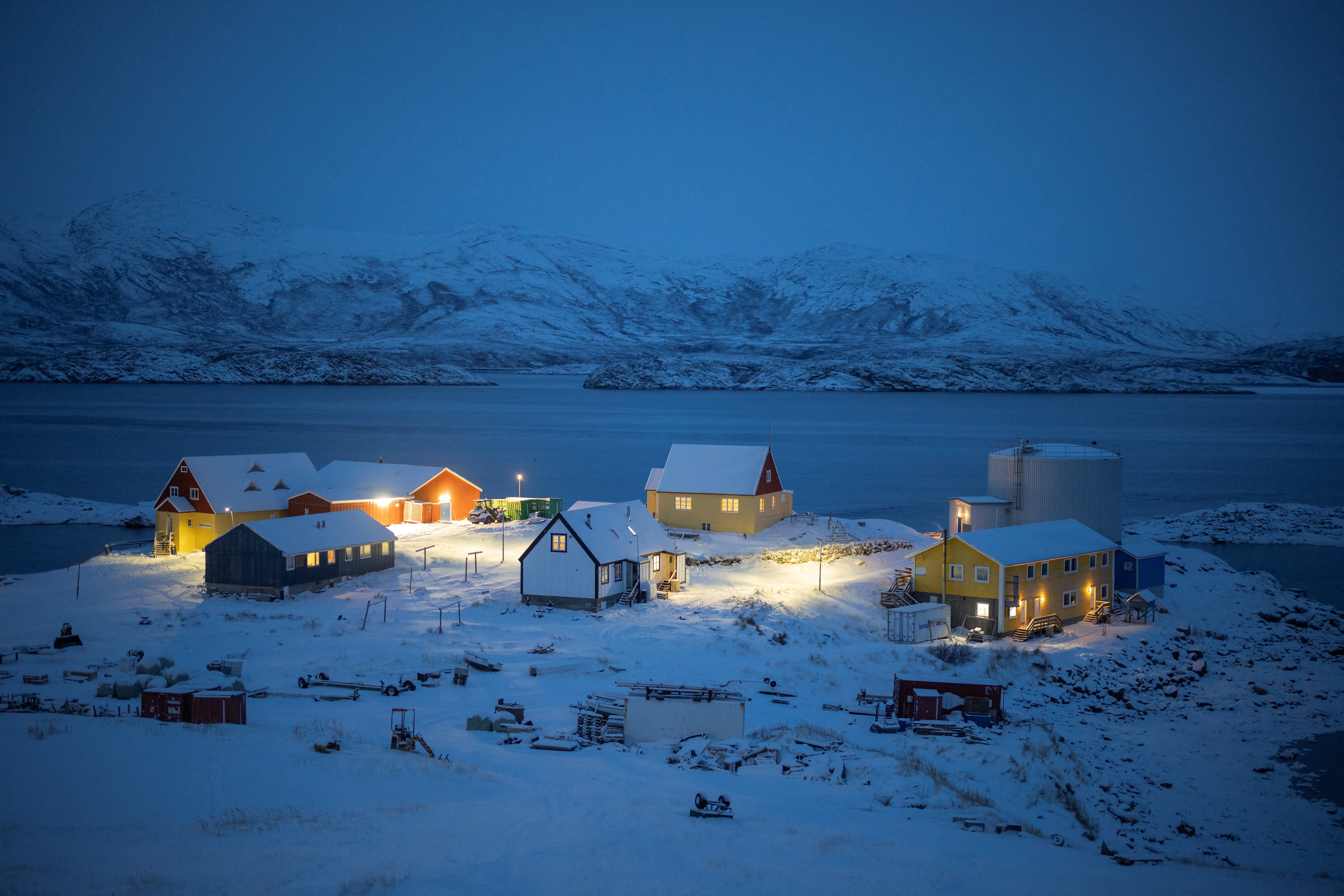 Lights illuminate the village of Kapisillit, Greenland, January 19, 2026.