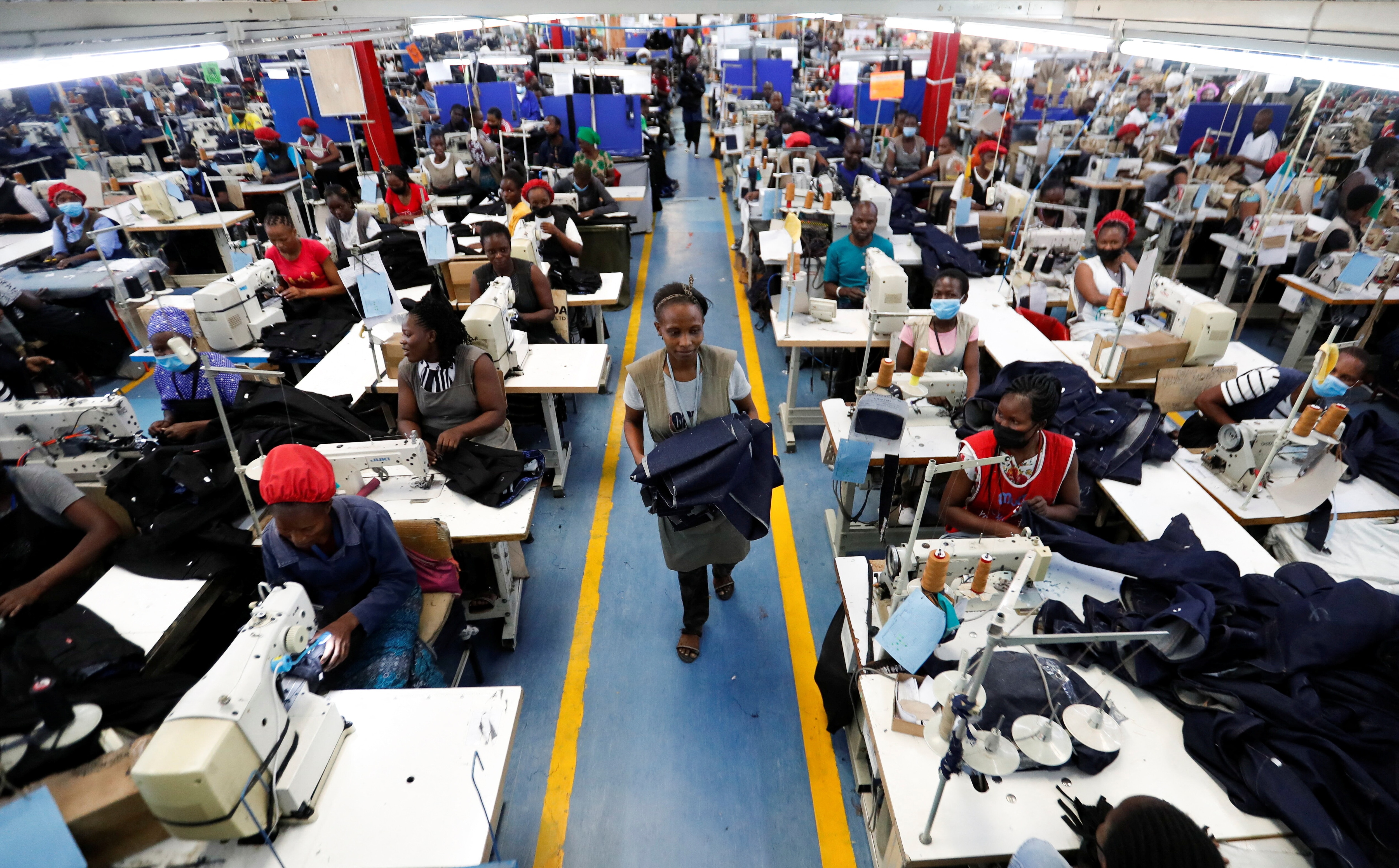 Kenyan workers prepare clothes for export at the United Aryan Export Processing Zone (EPZ) factory operating under the U.S. African Growth and Opportunity Act (AGOA), in Ruaraka district of Nairobi, Kenya April 4, 2025. REUTERS/Thomas Mukoya. multilateralism