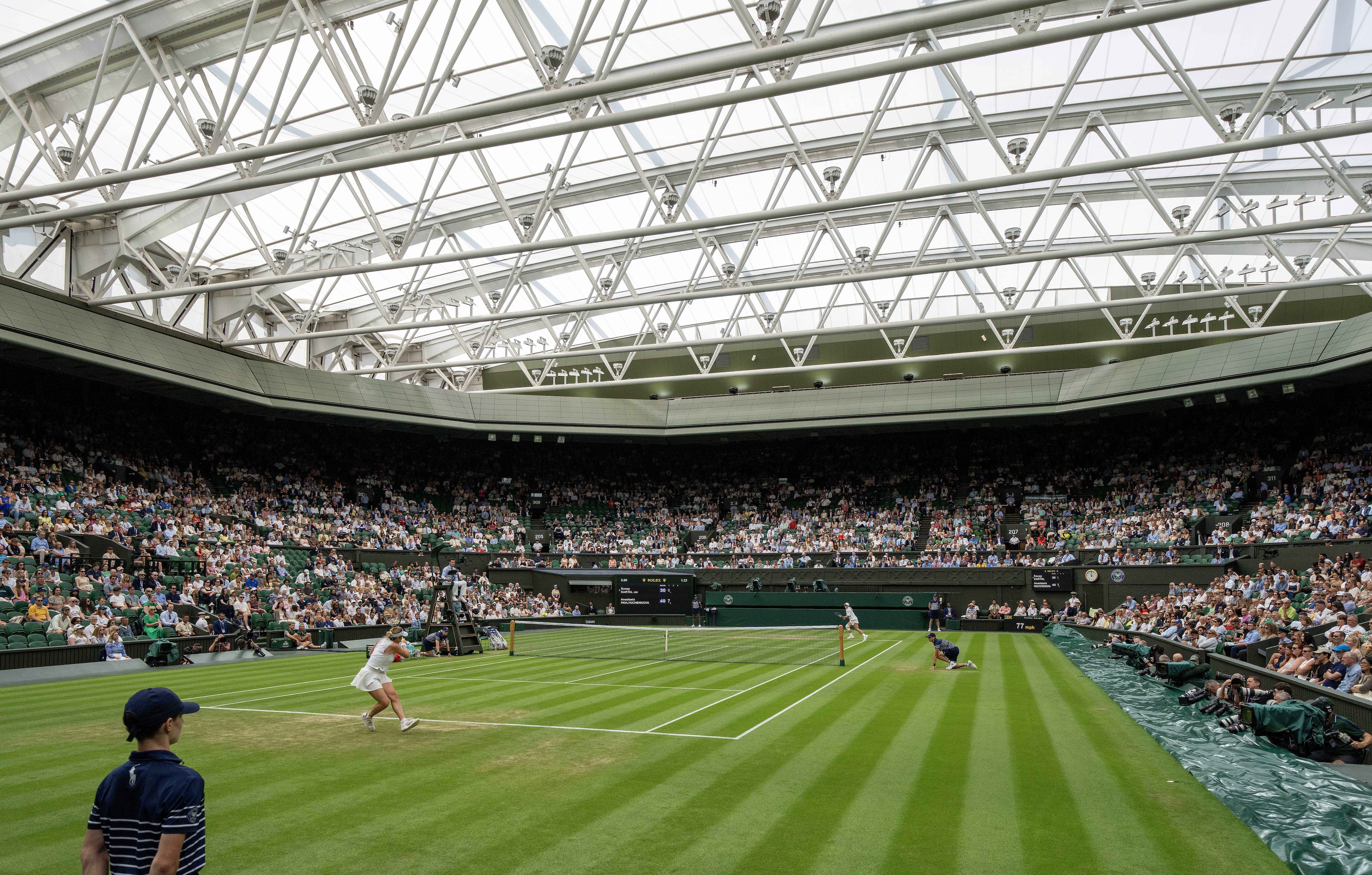 General view of Centre Court with the roof closed during the Anastasia Pavlyuchenkova and Sonny Kartal of Great Britain match on day seven at the All England Lawn Tennis and Croquet Club; Jul 6, 2025; Wimbledon, United Kingdom. 
