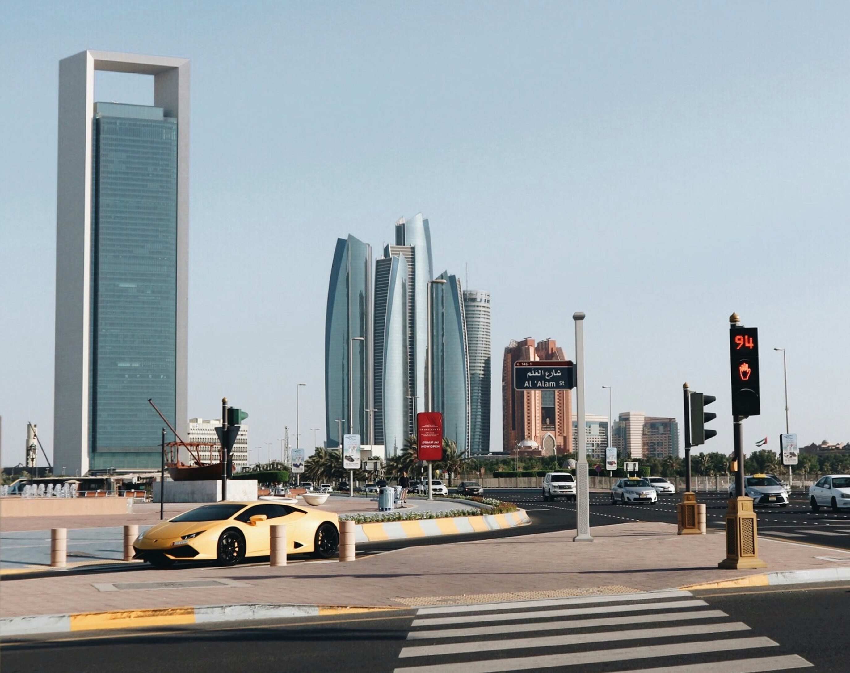 A sports car driving in Dubai, illustrating the amount of private wealth in the city