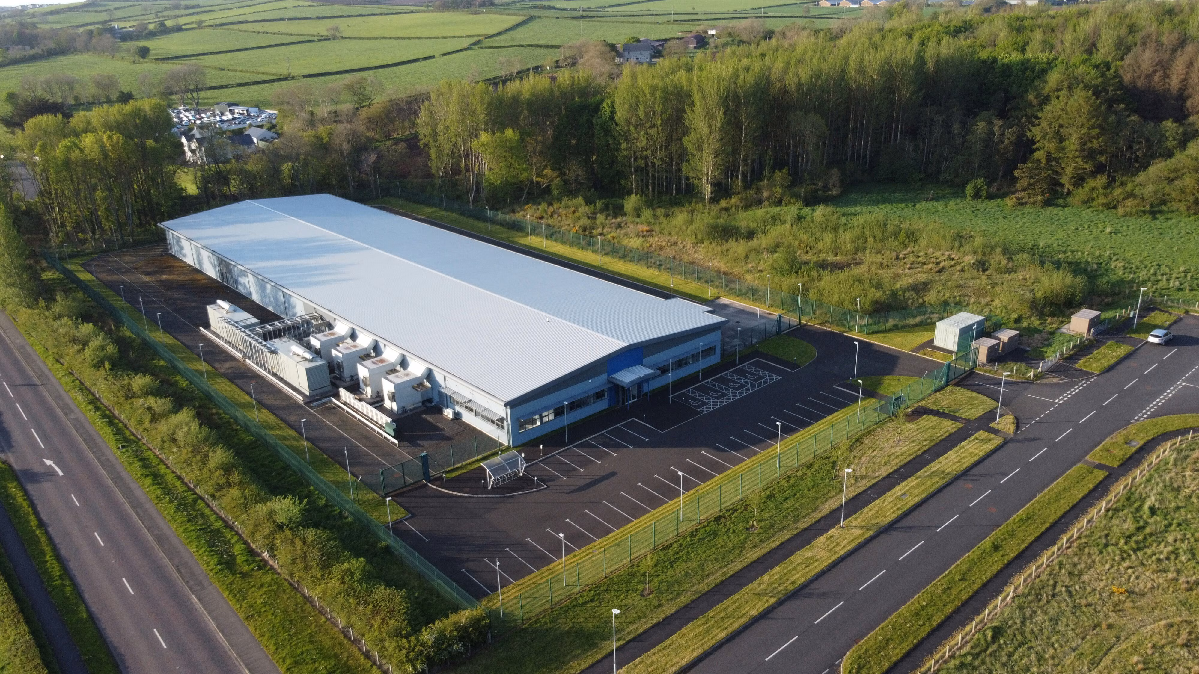 Aerial view of a modern hyperscale data centre complex.