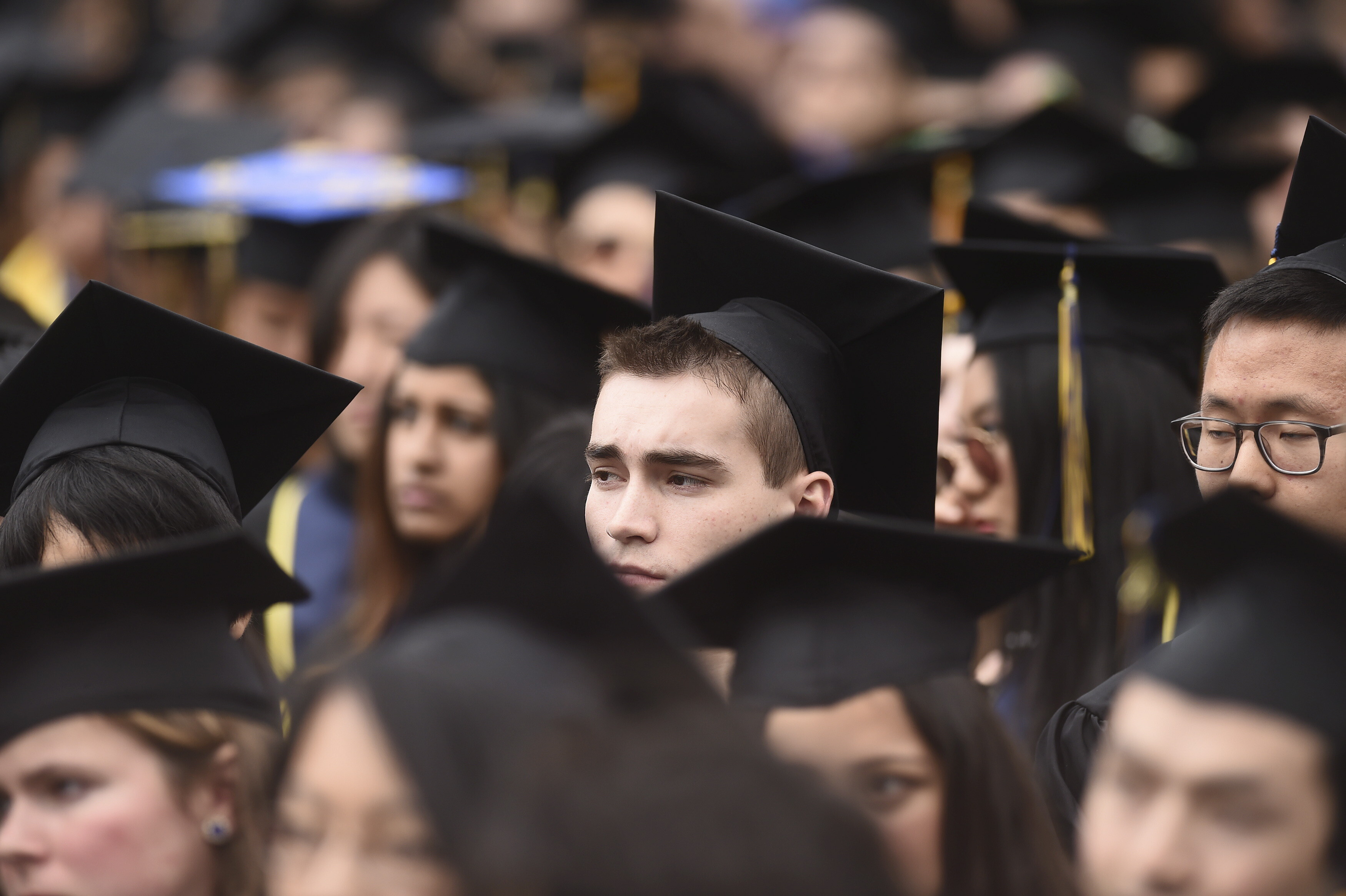 Graduates attend commencement at University of California, Berkeley in Berkeley May 16, 2015: Efforts around AI in higher education are moving from deterrence to how to build trust in tools