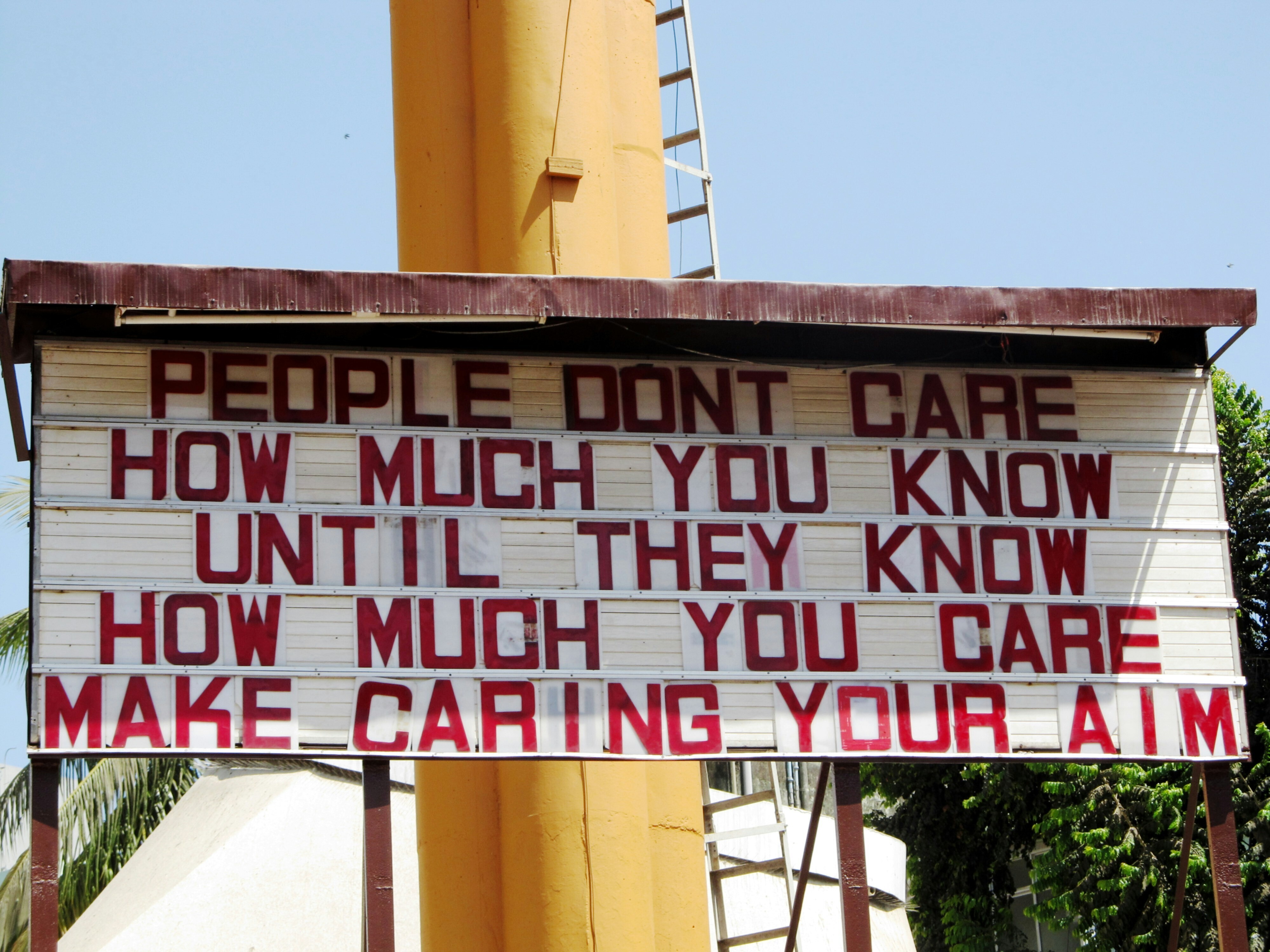A sign about a caring is this compatible with capitalism