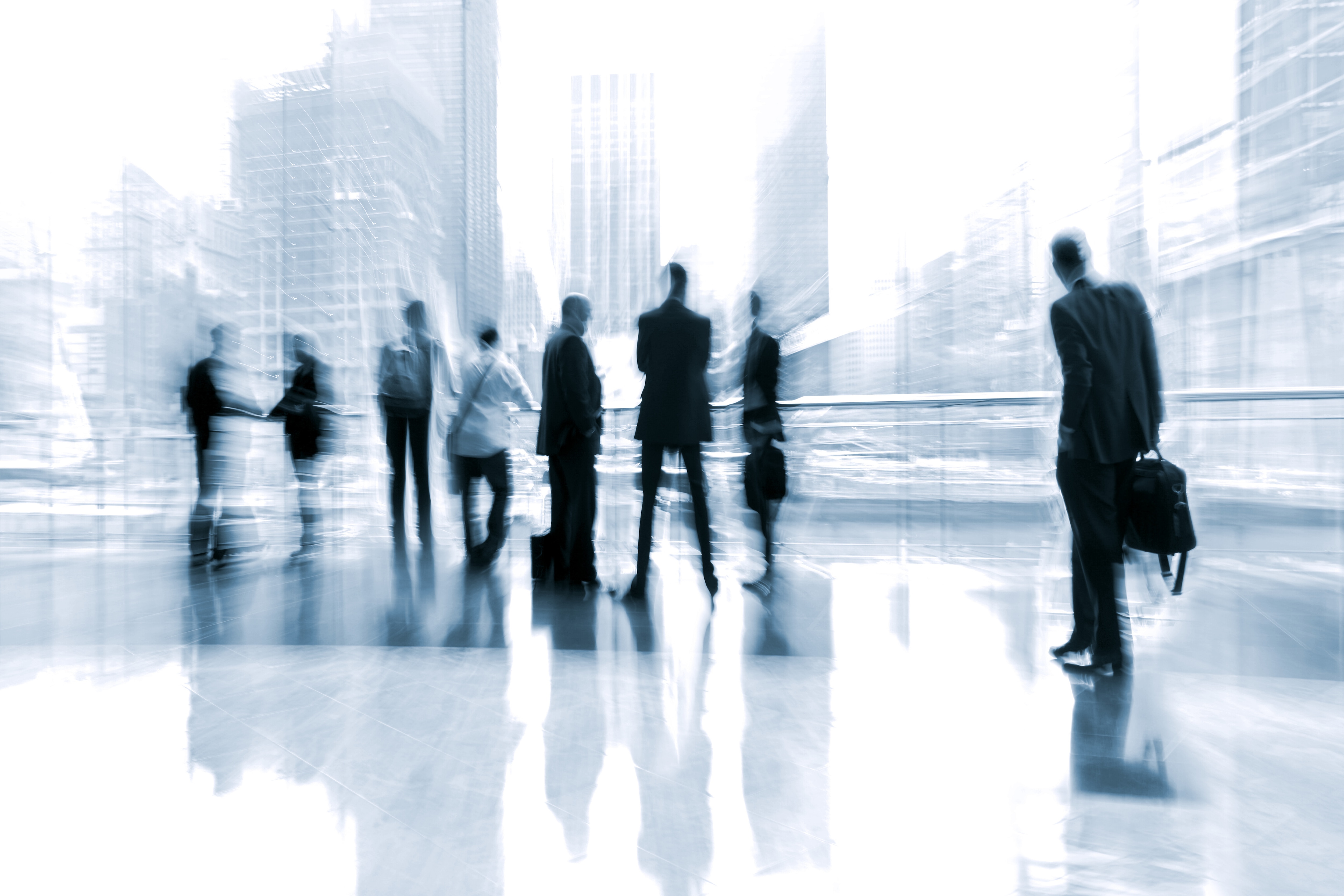 Workers outside an office building, they are not AI-native