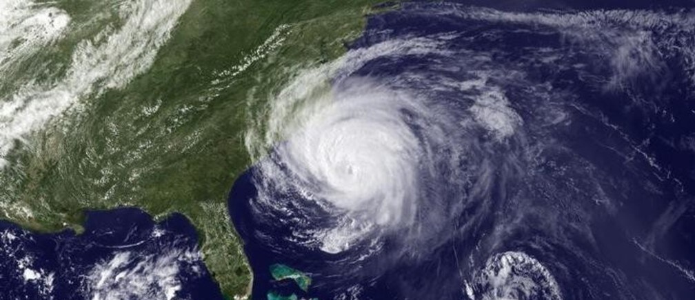 Hurricane Earl (C) is pictured moving in the Atlantic Ocean, off the east coast of the United States, in this National Oceanic and Atmospheric Administration (NOAA) satellite image taken and released on September 2, 2010. Hurricane Earl took aim at North Carolina on Thursday and was on track to lash its barrier islands with dangerous winds and pounding surf before cutting a path up the U.S. East Coast. Tropical Storm Fiona is pictured at lower right. REUTERS/NOAA/Handout (UNITED STATES - Tags: ENVIRONMENT SCI TECH) FOR EDITORIAL USE ONLY. NOT FOR SALE FOR MARKETING OR ADVERTISING CAMPAIGNS. THIS IMAGE HAS BEEN SUPPLIED BY A THIRD PARTY. IT IS DISTRIBUTED, EXACTLY AS RECEIVED BY REUTERS, AS A SERVICE TO CLIENTS