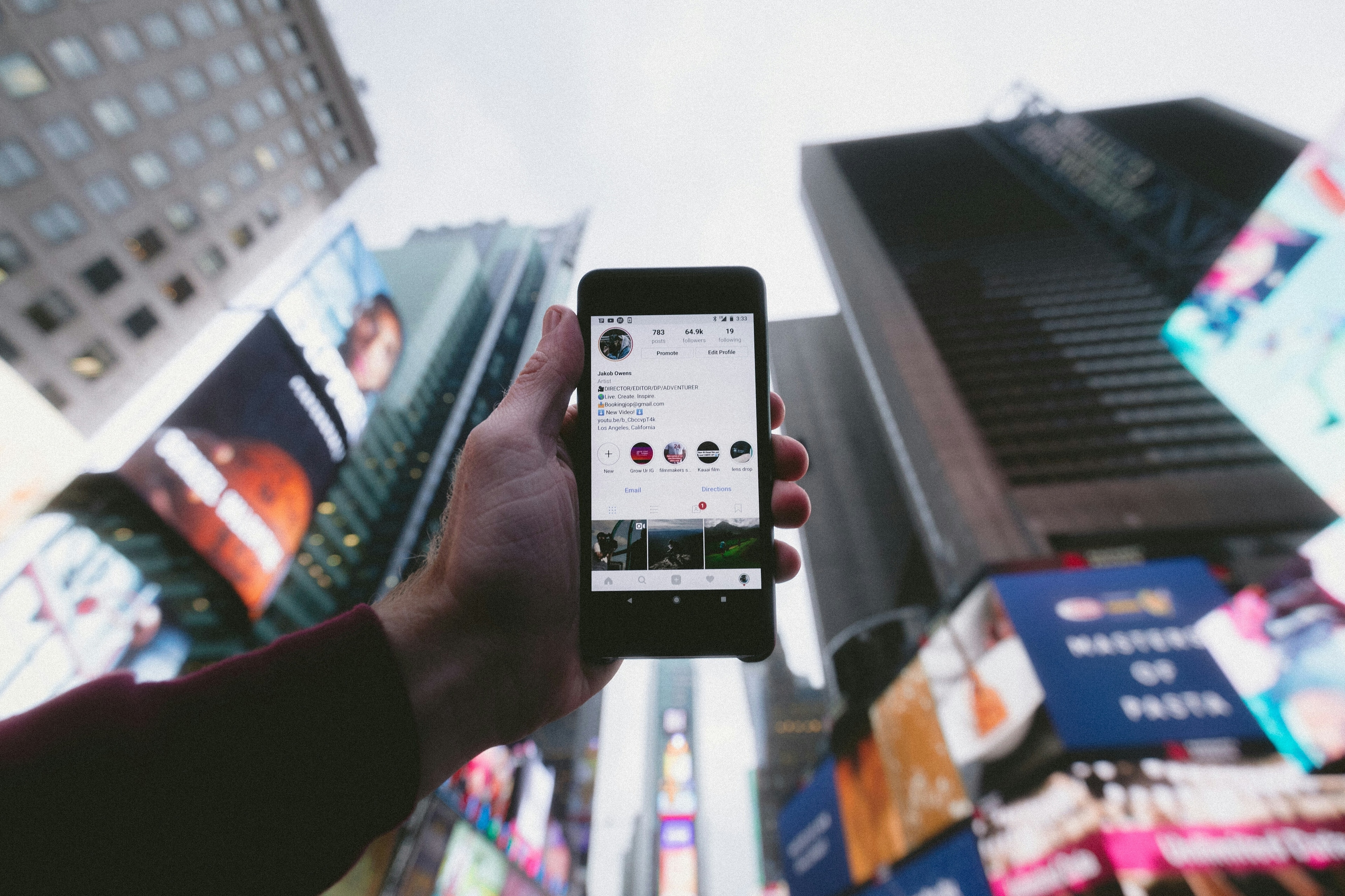 Person holding phone.