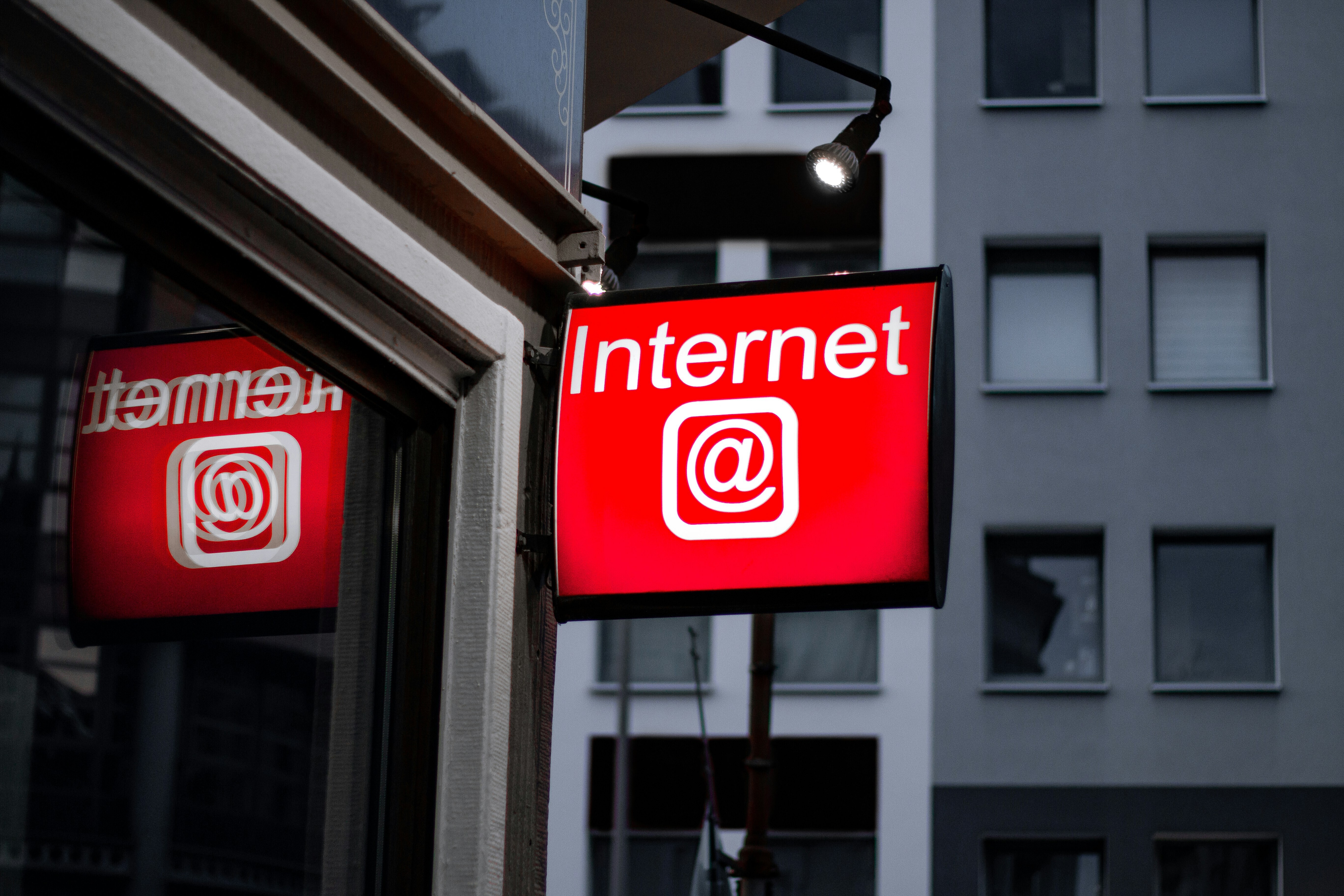 A red sign of an internet cafe: Digital engagement gave rise to the attention economy but it could be leveraged for something far more beneficial