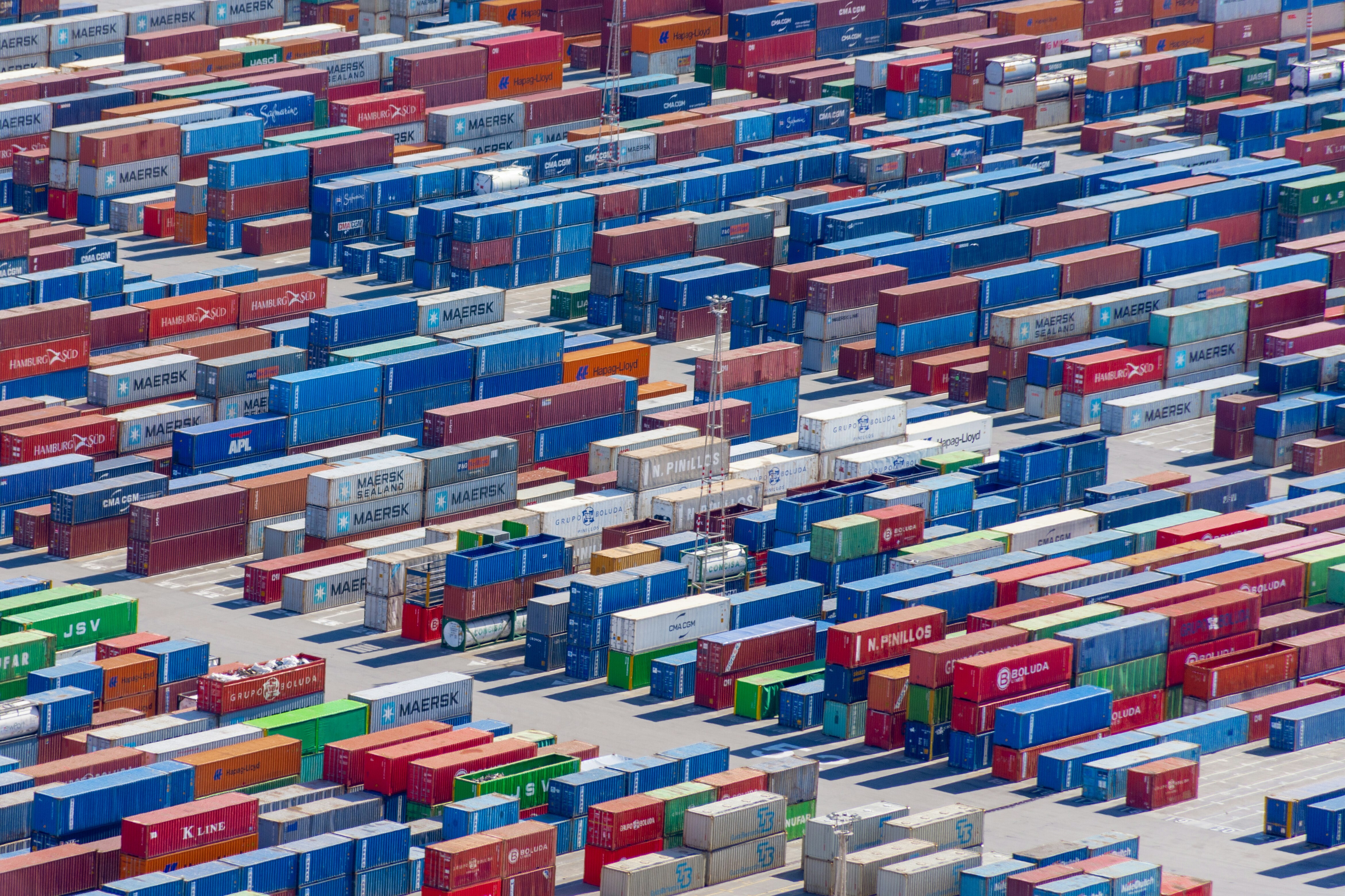 Lots of colourful shipping containers: The C-Suite must identify strategies to strengthen  industrial competitiveness