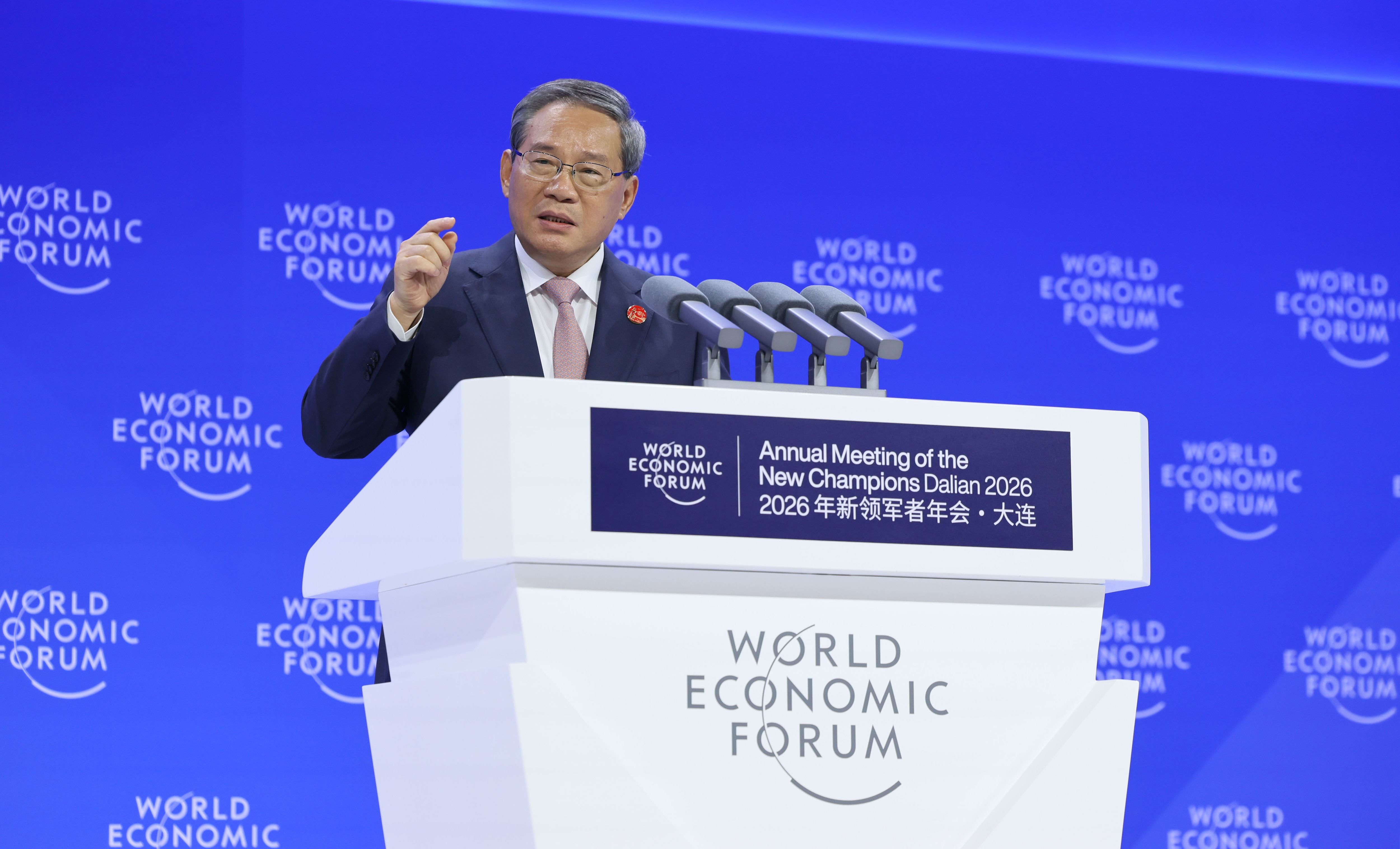 Opening Plenary session with Alois Zwinggi, President and CEO, World Economic Forum; Gim Huay Neo, Managing Director, World Economic Forum; Li Qiang, Premier of the People's Republic of China; Wang Xinwei, Governor, People's Government of Liaoning Province, People's Republic of China during the Annual Meeting of the New Champions in Dalian, People's Republic of China, on 24/6/2026 from 10:00 to 10:45 in the Dalian International Conference Center - Plenary Hall (Zone C), Opening. (opening). Â©2026 World Economic Forum