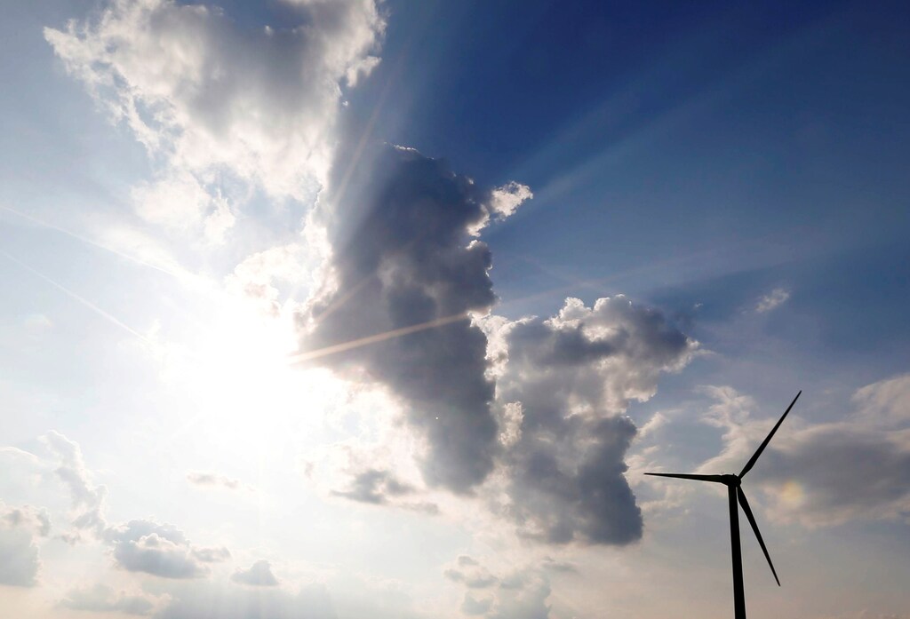 A power-generating wind turbine is seen near the city of Mouchamps, France, June 13, 2018. REUTERS/Regis Duvignau - RC1FDDD0CCC0