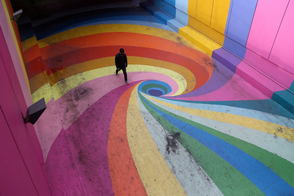 A man walks along a pedestrian street as local town halls have increased the lockdown restrictions during the coronavirus disease (COVID-19) outbreak, in Santiago, Chile, March 25, 2021. REUTERS/Ivan Alvarado TPX IMAGES OF THE DAY - RC2FIM9A8RFG