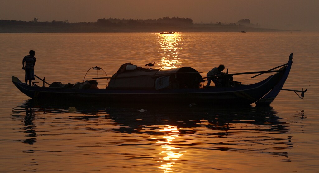 Cambodian fishermen on the Mekong river