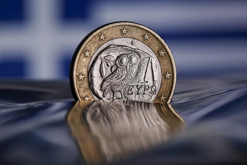 A one Euro coin with a Greek owl is seen in this picture illustration taken in Rome, Italy July 9, 2015. The European Union's chairman joined growing international calls for Greece to be granted debt restructuring as part of any new loan deal if it delivers convincing reforms to avert imminent bankruptcy.