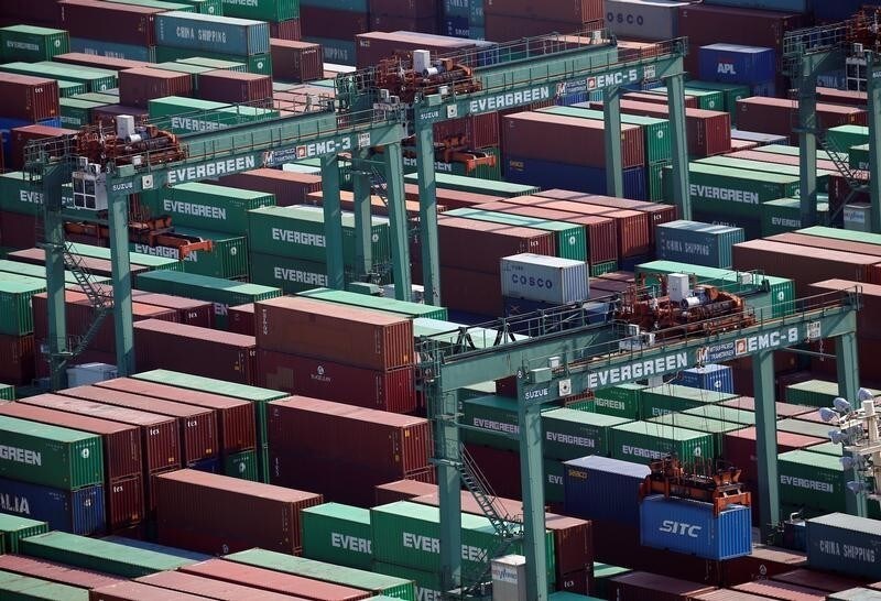 Shipping containers are seen at a port in Tokyo, Japan, March 22, 2017. REUTERS/Issei Kato - RC1E97683020