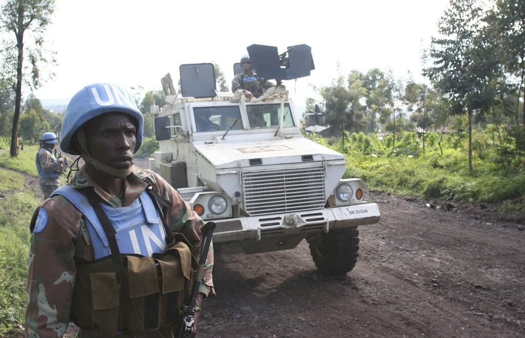 South African peacekeepers patrol the streets of Goma in eastern Democratic Republic of Congo, December 2, 2015. Christmas came early on Wednesday with hampers, gifts and praise from their political masters for hundreds of South African peacekeepers in Democratic Republic of Congo struggling to make an impact in the face of its chaotic and confusing politics. REUTERS/Ed Cropley - GF20000082389