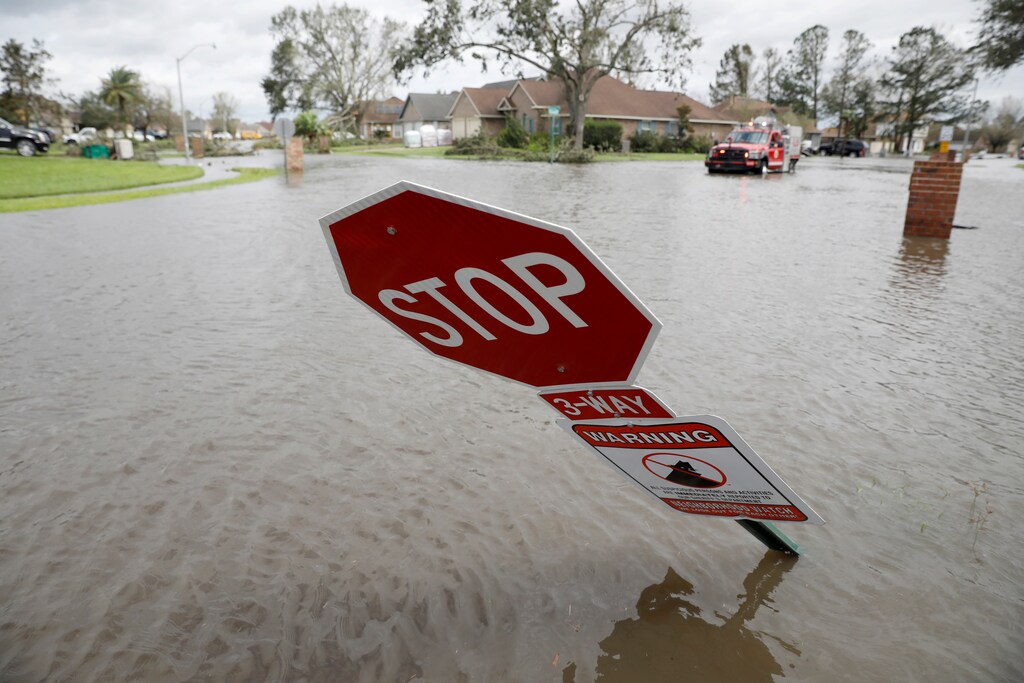 A flooded street is pictured after Hurricane Ida made landfall in Louisiana, in Laplace, Louisiana, U.S. August 30, 2021. REUTERS/Marco Bello - RC2RFP9QSW24