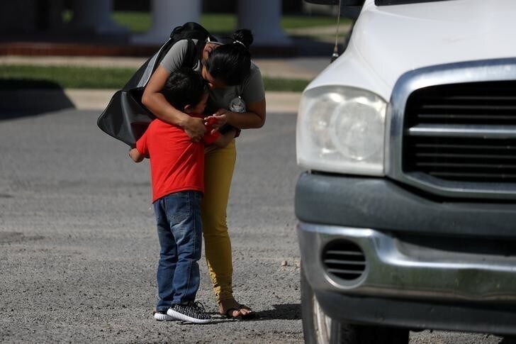 Anita Areli Ramirez Mejia, an asylum seeker from Honduras separated from her six year-old son Jenri near the Mexico-U.S. border, is reunited with him in Harlingen, Texas, U.S., July 13, 2018. Picture taken July 13, 2018. REUTERS/Loren Elliott TPX IMAGES OF THE DAY