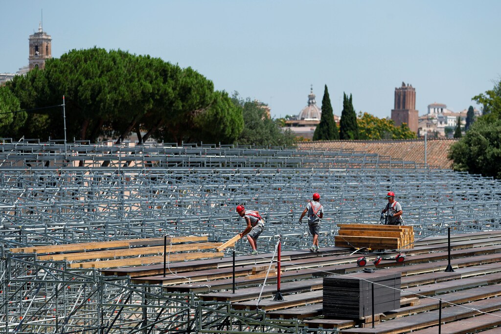 Workers build a seating area for socially distanced Rome Opera House's summer performances at Circus Maximus, the ancient chariot racetrack, following the coronavirus disease (COVID-19) outbreak in Rome, Italy, June 25, 2020. Picture taken June 25, 2020. REUTERS/Guglielmo Mangiapane - RC2BSH9A8NIX