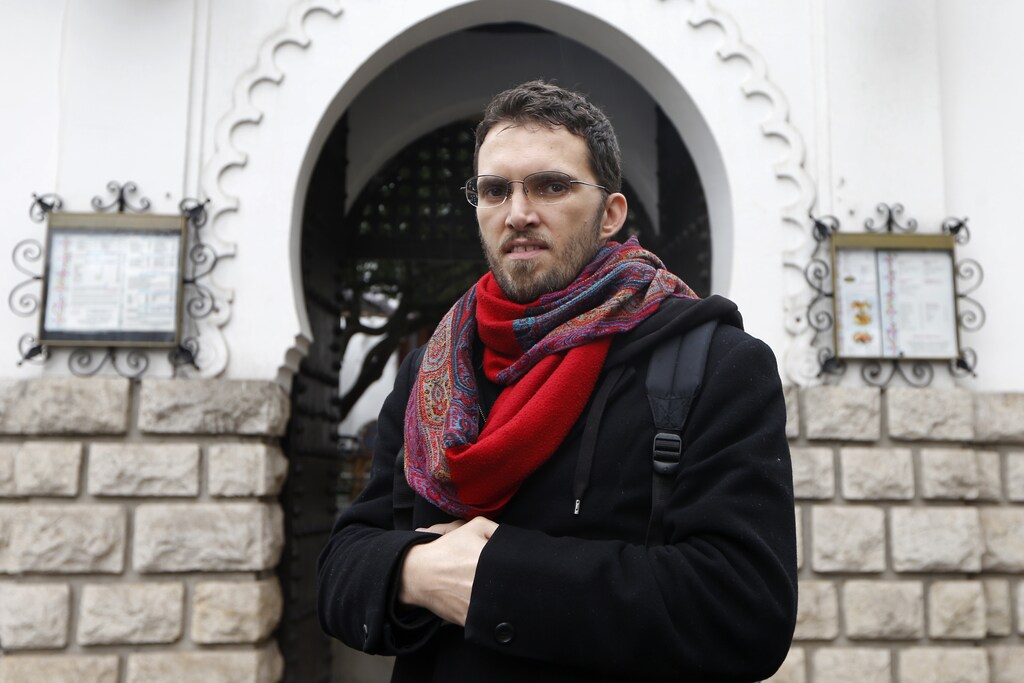 Ludovic-Mohamed Zahed, a French-Algerian homosexual Muslim, poses in front of Paris Mosque.