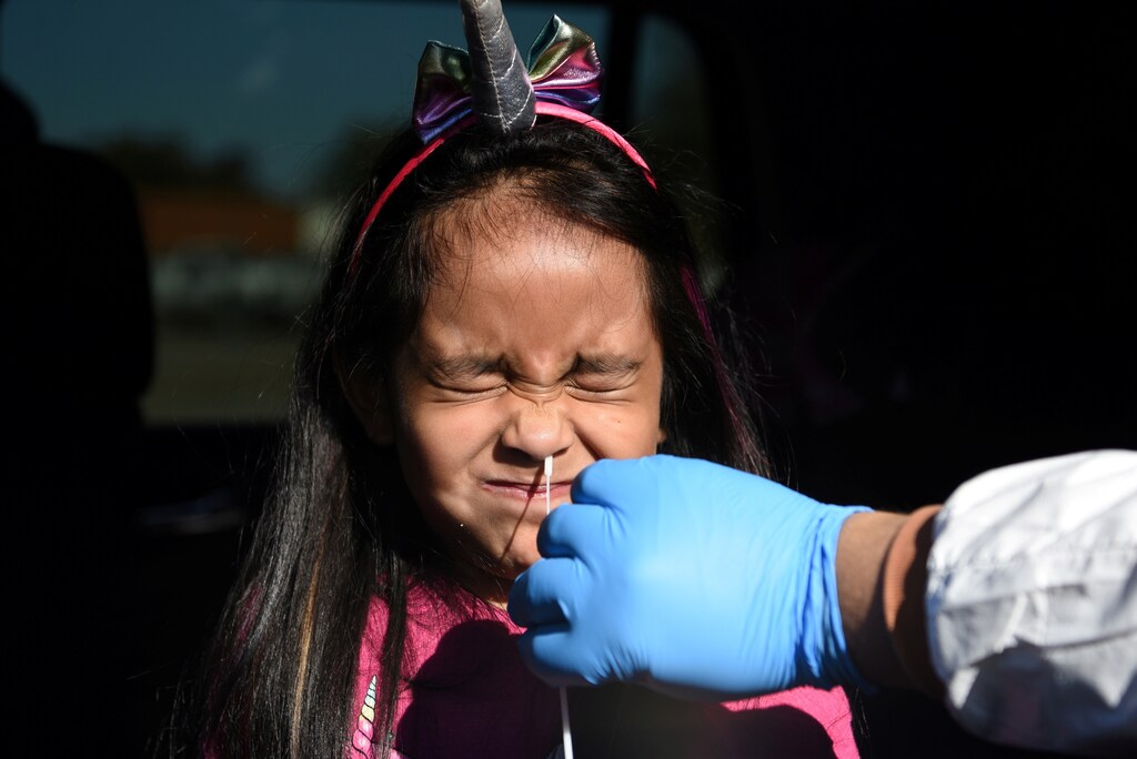 Valerie Dominguez, whose results came back negative, is tested for coronavirus disease (COVID-19) at United Memorial Medical Center in Houston, Texas, U.S., December 9, 2020. Picture taken December 9, 2020.