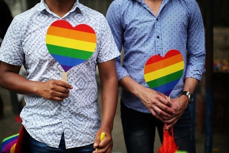 People attend the Gay Pride Parade in San Salvador, El Salvador, June 24, 2017. REUTERS/Jose Cabezas - RC1E5C5C1820