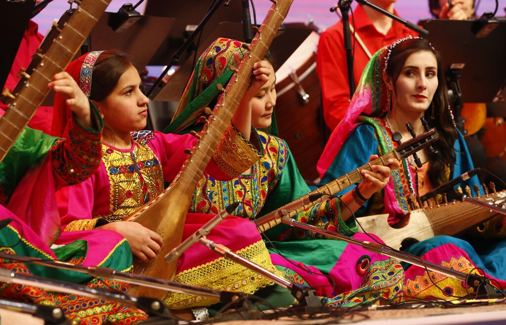 The Afghan Woman Orchestra Zohra performs during the closing session of the World Economic Forum (WEF) annual meeting in Davos, Switzerland January 20, 2017. REUTERS/Ruben Sprich - RTSWIIU