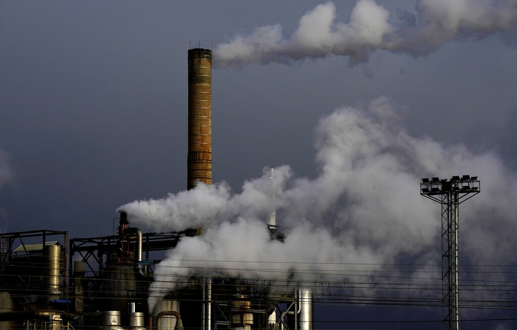Vapour comes out of chimneys at a sugar processing factory in Miranda de Ebro, Spain, December 14, 2018. REUTERS/Vincent West - RC1D7B221200