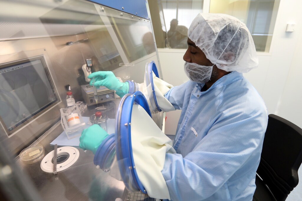 A medical nuclear analytical assistant prepares a rare cancer treatment, in Rotterdam, Netherlands.