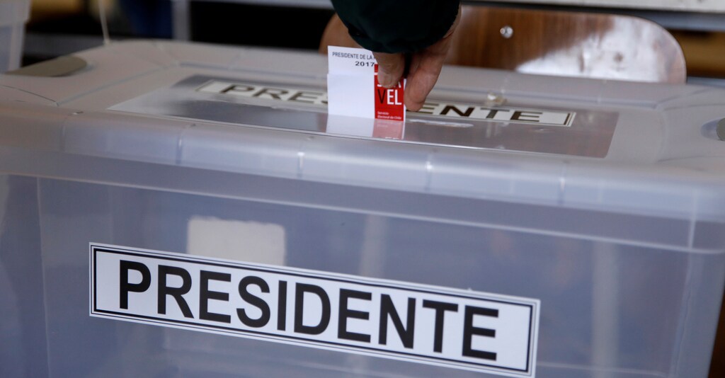 A citizen casts his ballot at a polling station in Chile