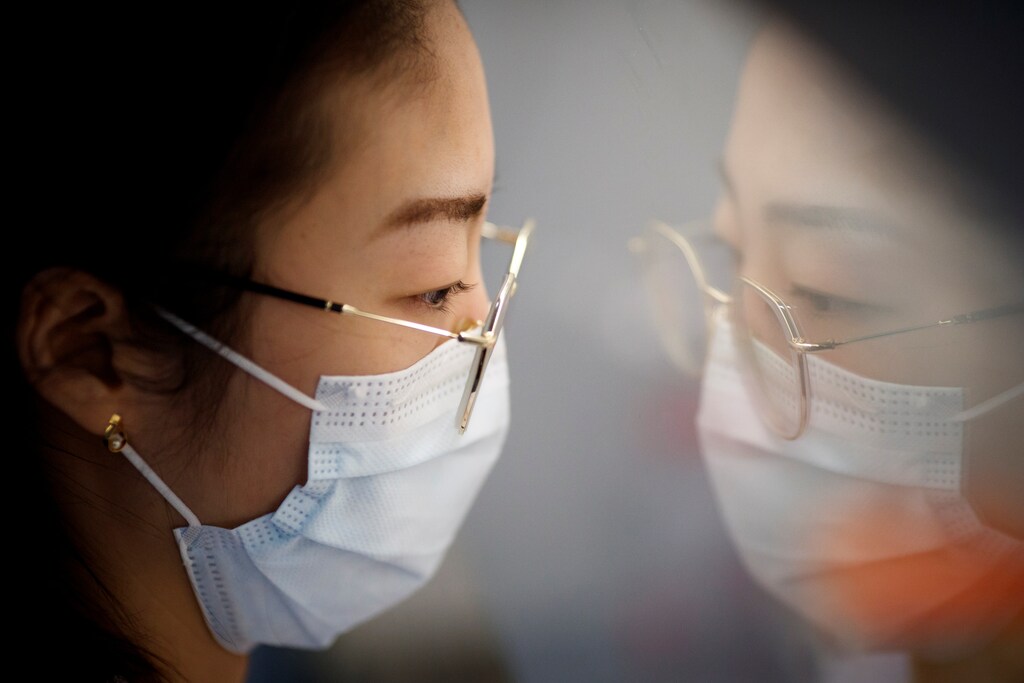 A scientist works in the lab of Linqi Zhang on research into novel coronavirus disease (COVID-19) antibodies for possible use in a drug at Tsinghua University's Research Center for Public Health in Beijing, China, March 30, 2020. Picture taken March 30, 2020. REUTERS/Thomas Peter - RC2MVF9VXHF2