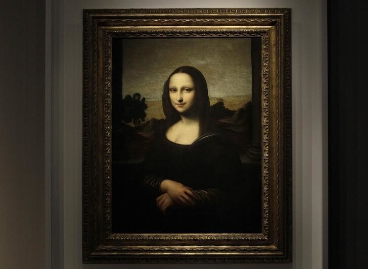 The portrait of Mona Lisa is pictured on a painting attributed to Leonardo da Vinci during a presentation in Geneva September 27, 2012. A package of diaries said to have been posted to the United States from Britain in the 1960s could provide a vital clue to the origin of a controversial portrait presented in Geneva last month as Leonardo da Vinci's original "Mona Lisa." Picture taken September 27, 2012. REUTERS/Denis Balibouse (SWITZERLAND - Tags: SOCIETY)