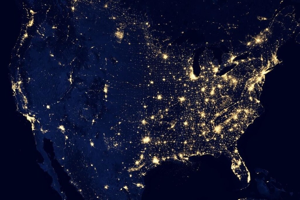 NASA image of a world map lit up at night
